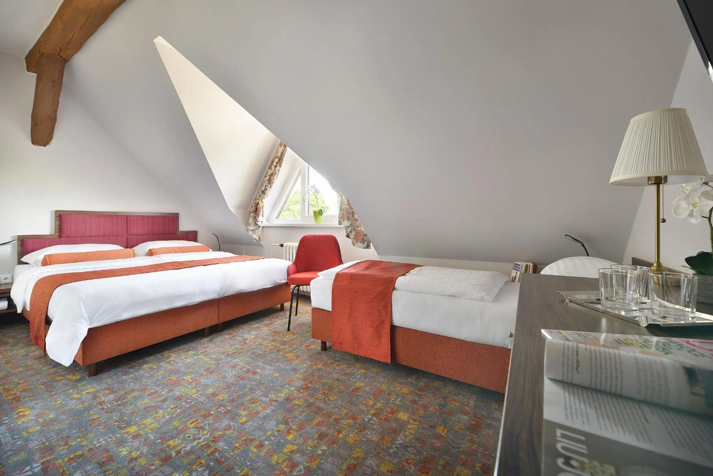 Bed in Maxmilian Lifestyle Resort