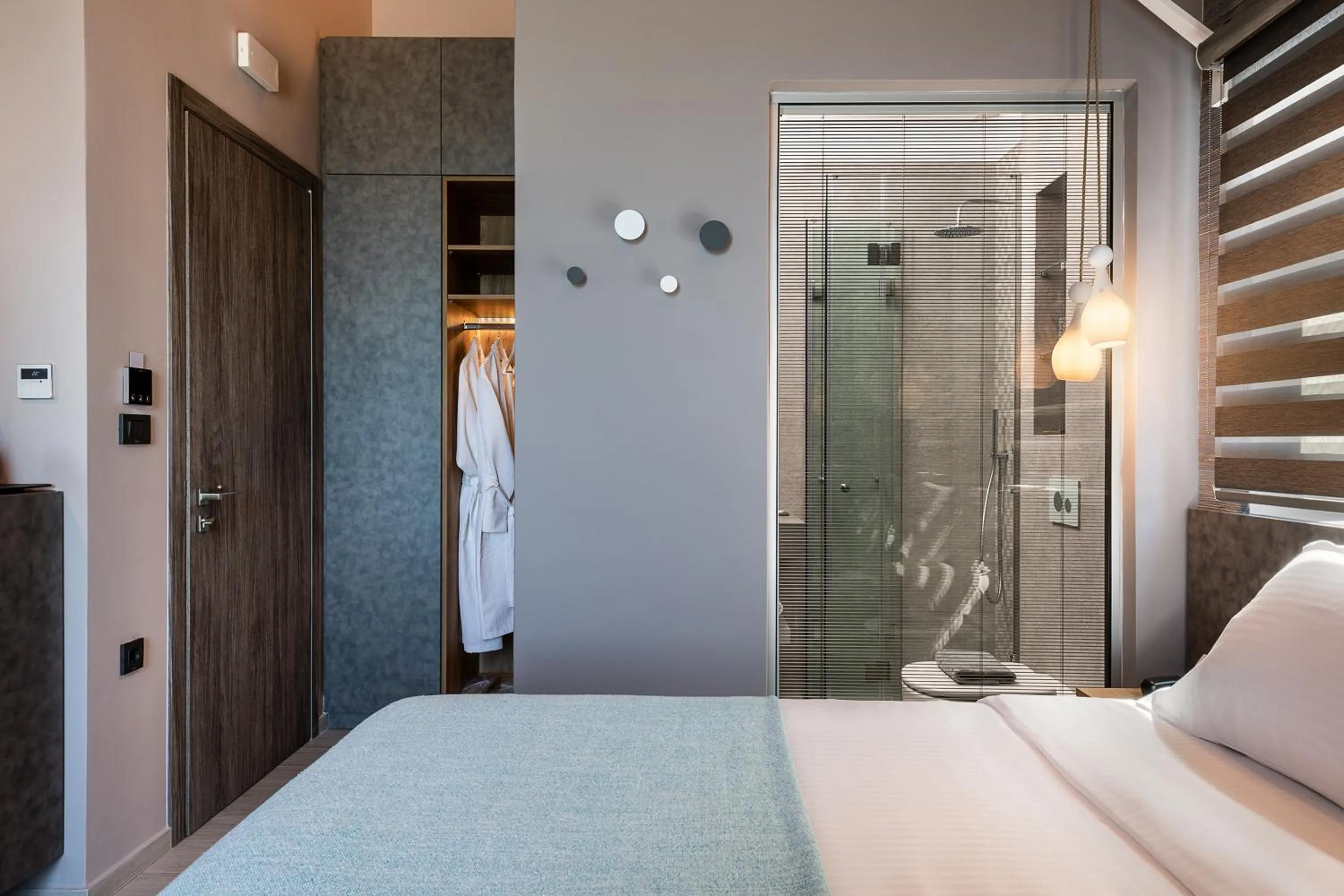 Shower, Bed in Ciel Collection Suites