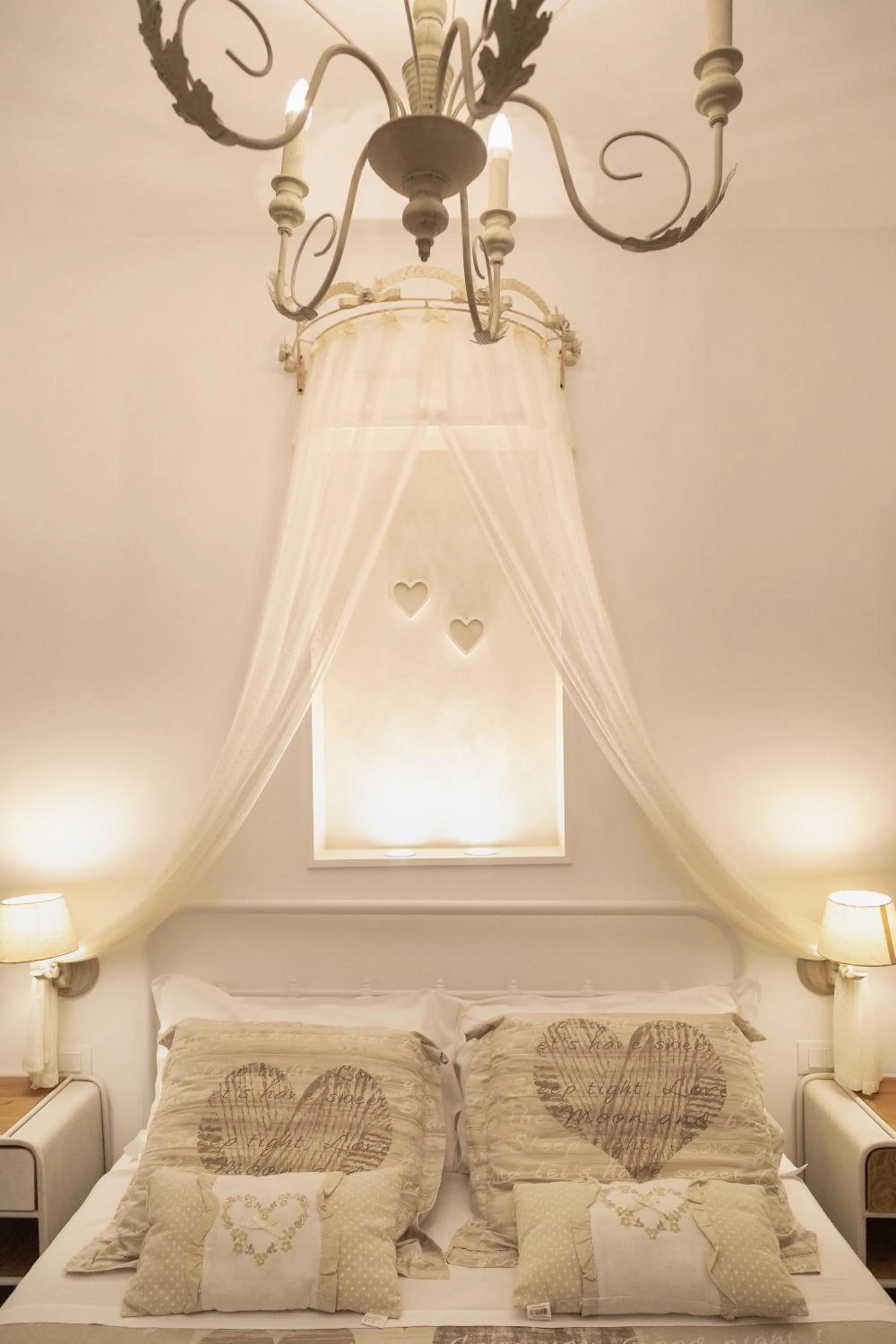 Bed in QuattroCuori Boutique Hotel & Spa