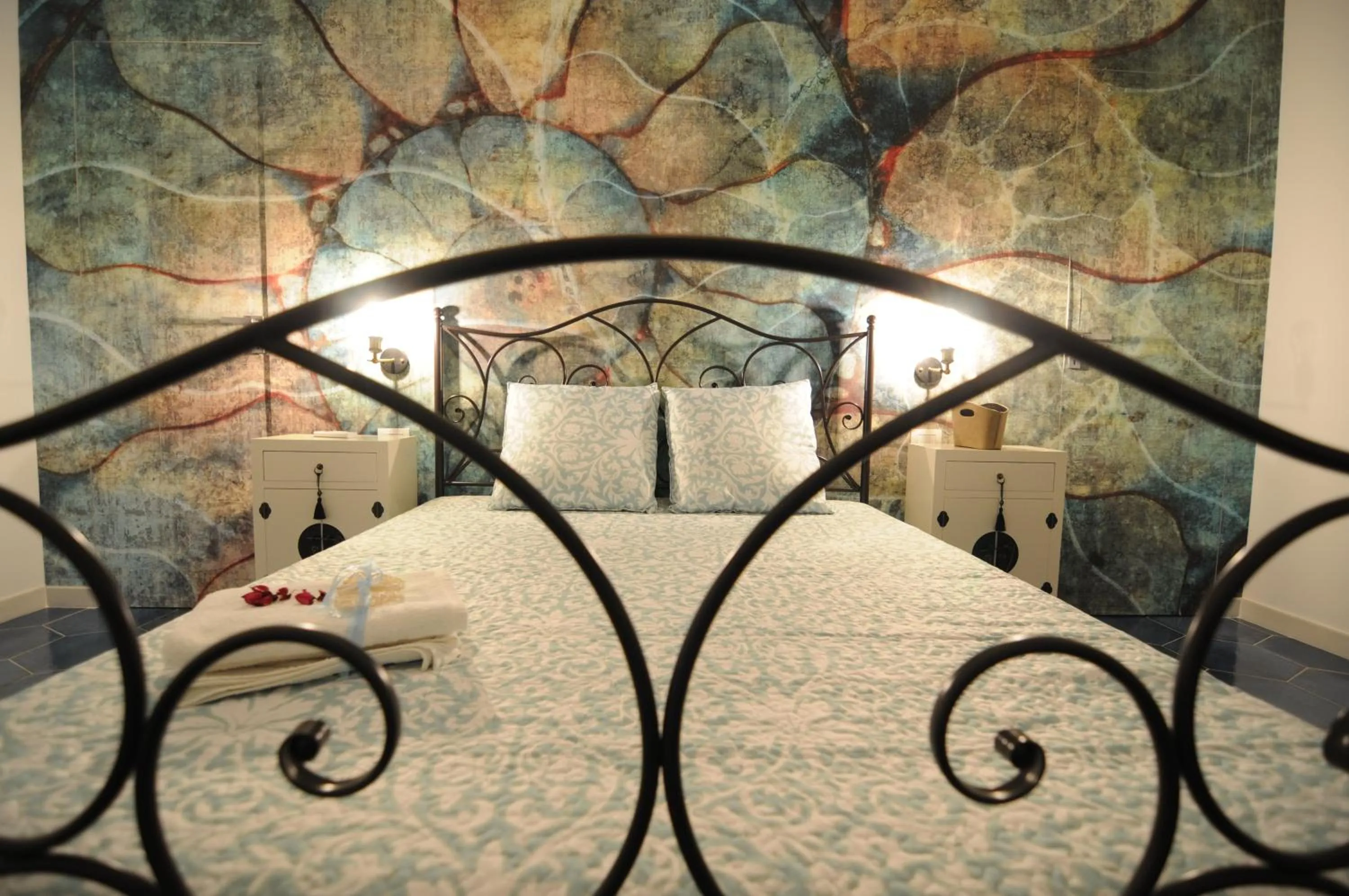 Bed in QuattroCuori Boutique Hotel & Spa