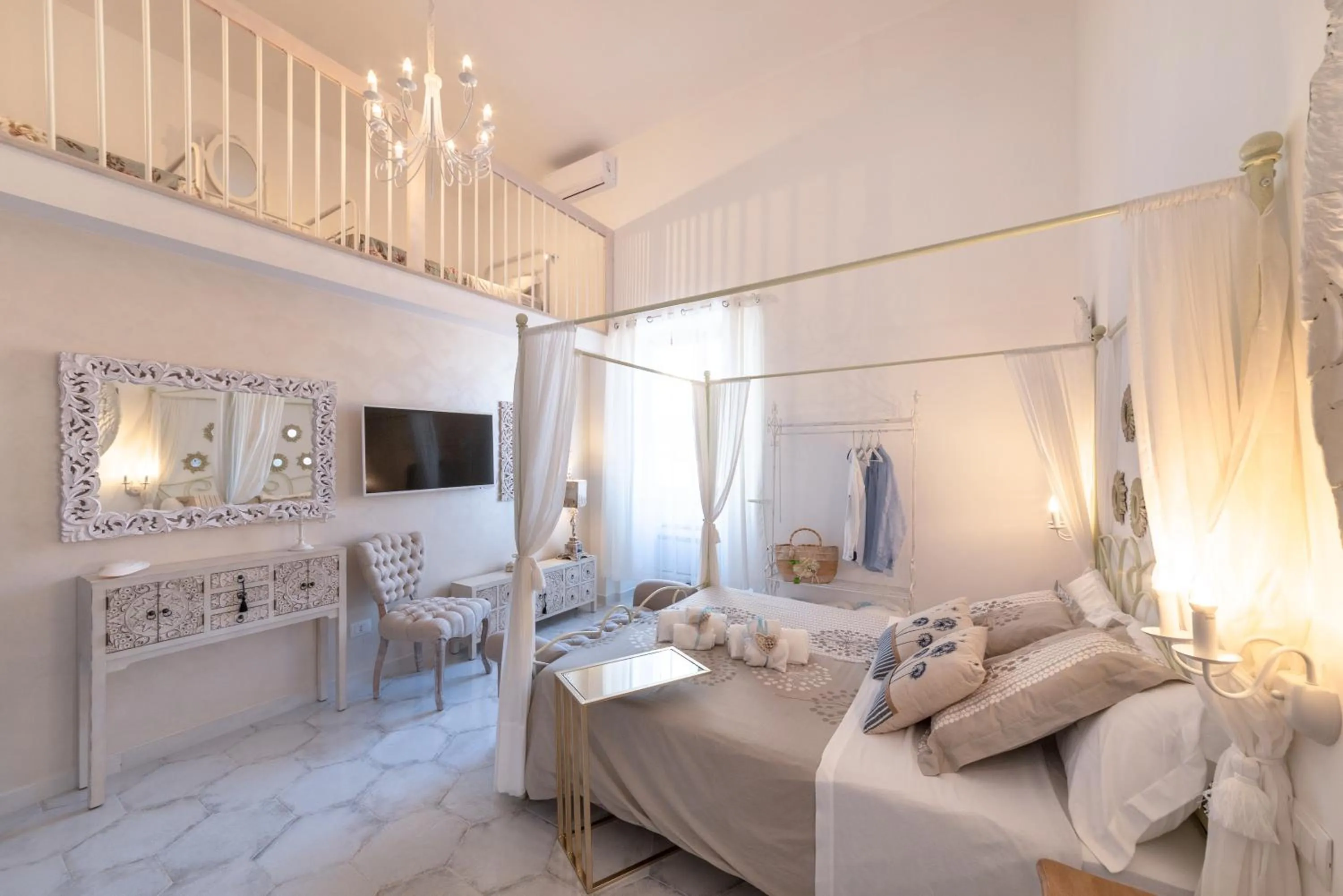 Bed in QuattroCuori Boutique Hotel & Spa