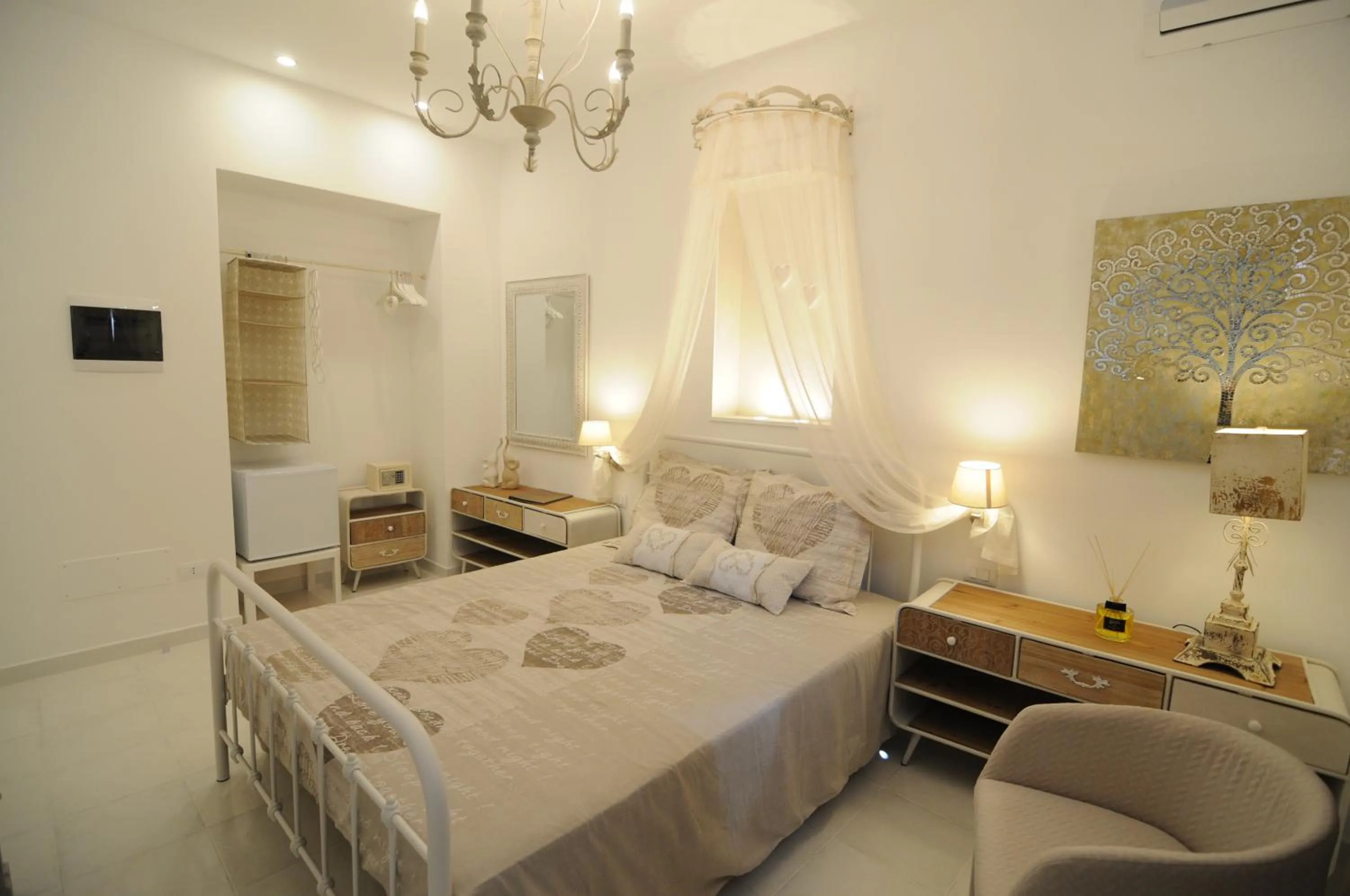 Bed in QuattroCuori Boutique Hotel & Spa