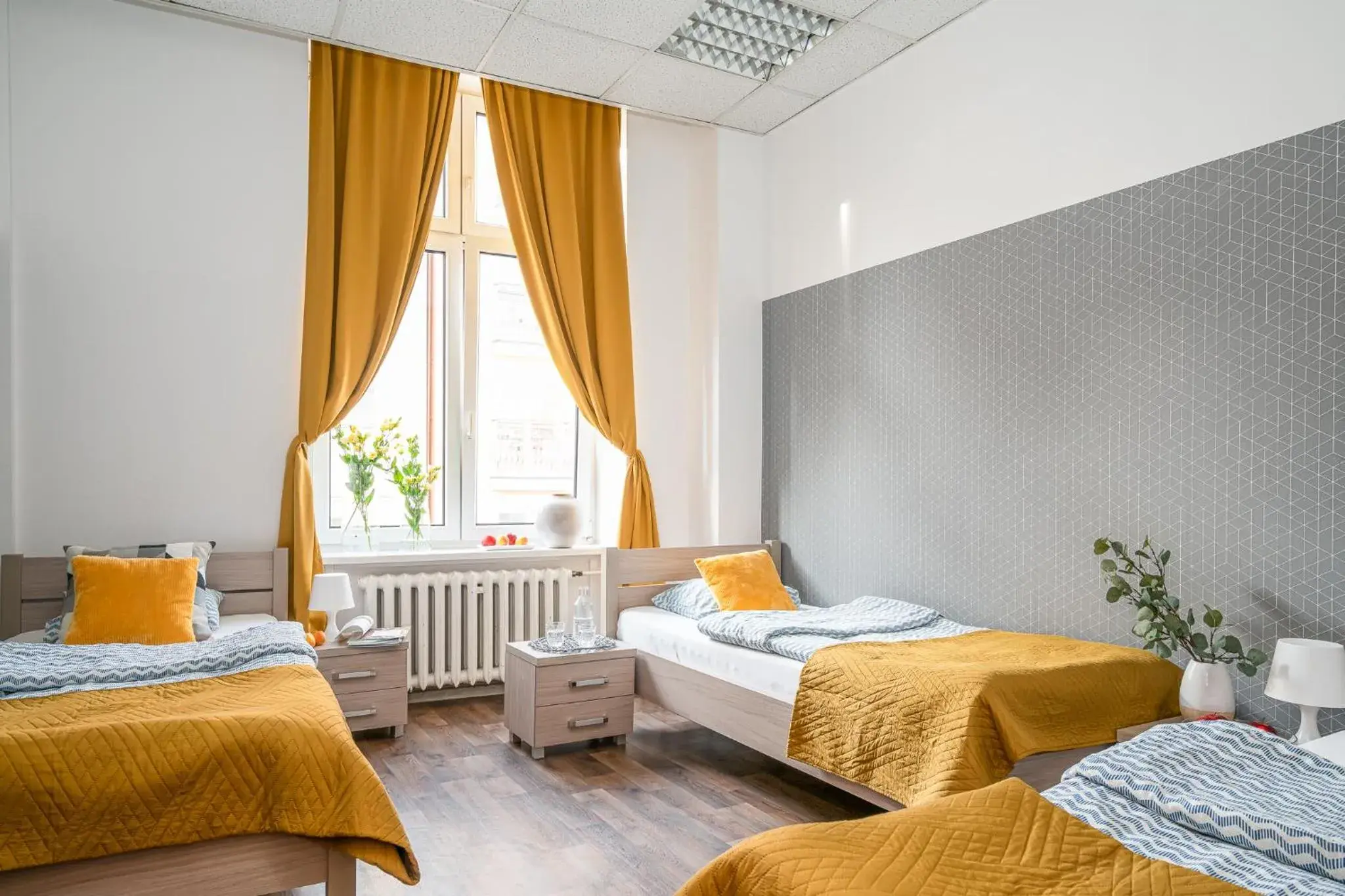 Classic Triple Room in Absynt Hostel Wrocław Classic Triple Room in Absynt Hostel Wrocław