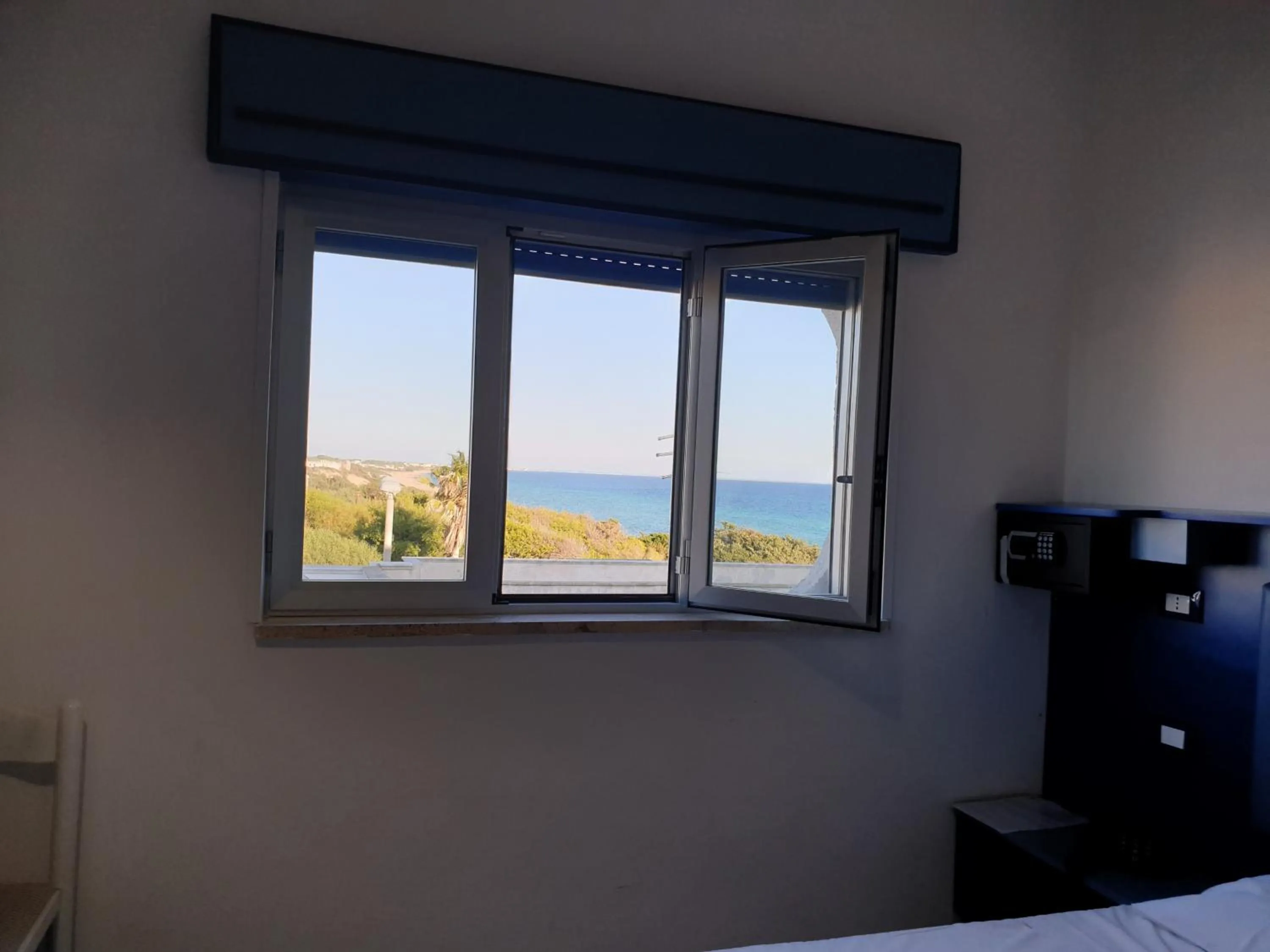Sea view, Bed in Hotel Caraibisiaco sul mare