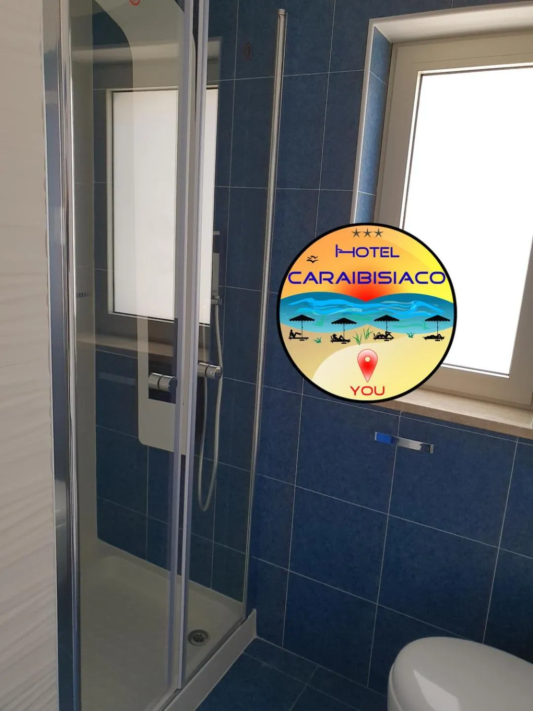 Shower in Hotel Caraibisiaco sul mare