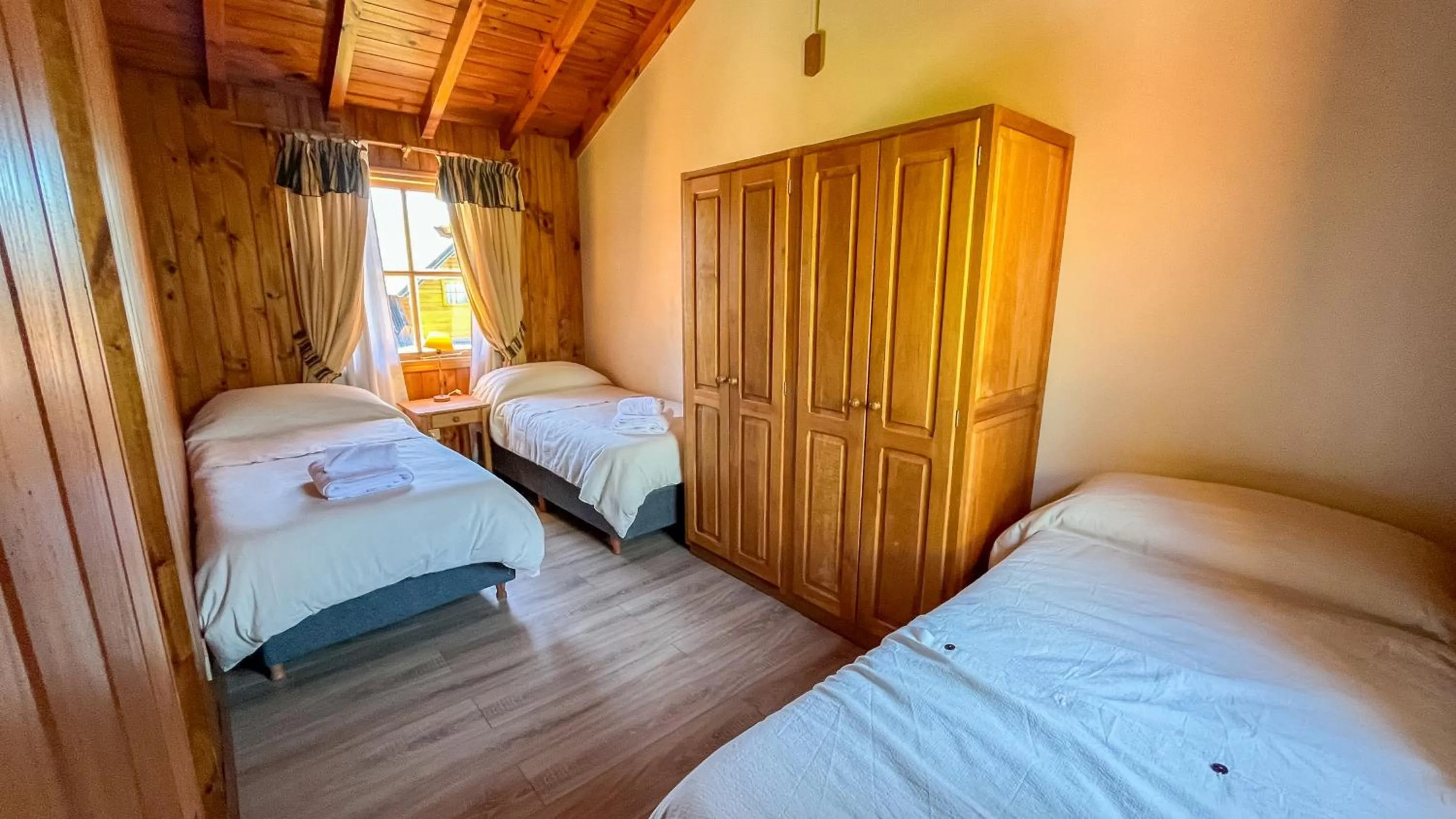 Bed in Hosteria y Cabañas Posada Quinen