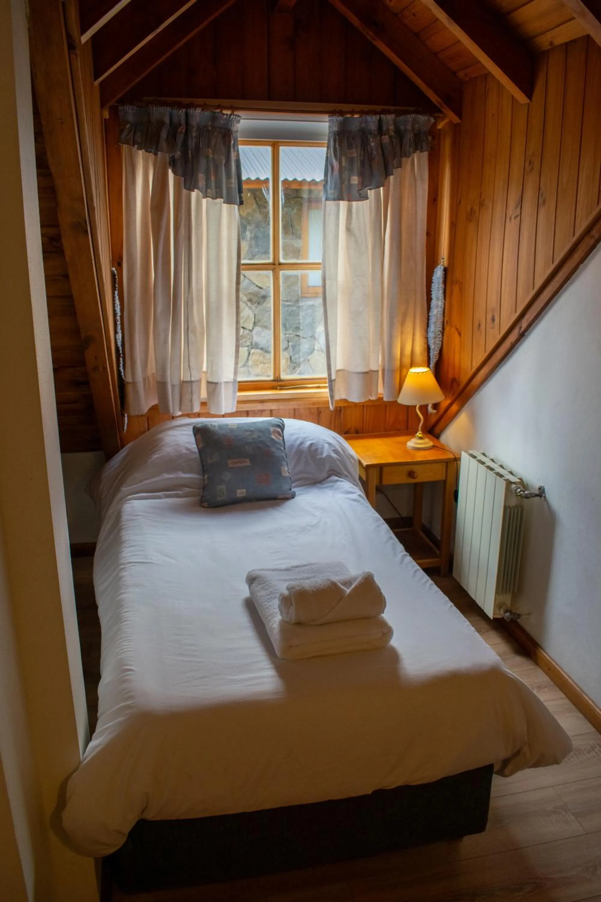 Bed in Hosteria y Cabañas Posada Quinen