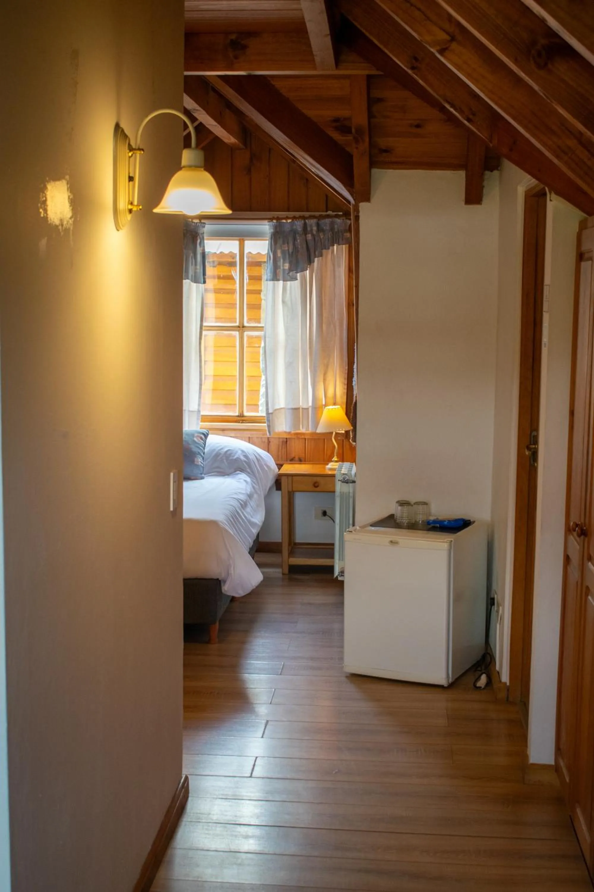 Bed in Hosteria y Cabañas Posada Quinen