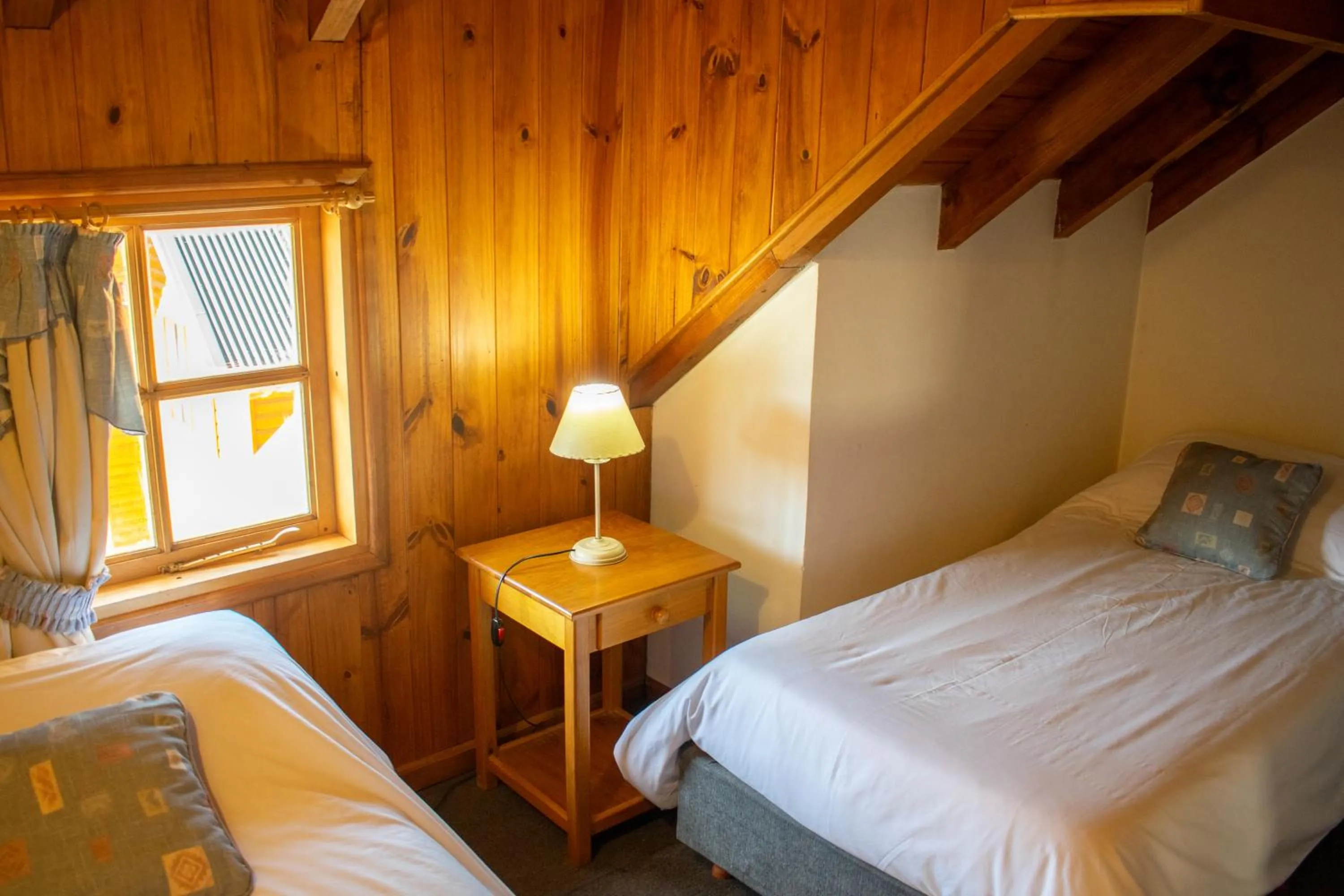 Bed in Hosteria y Cabañas Posada Quinen