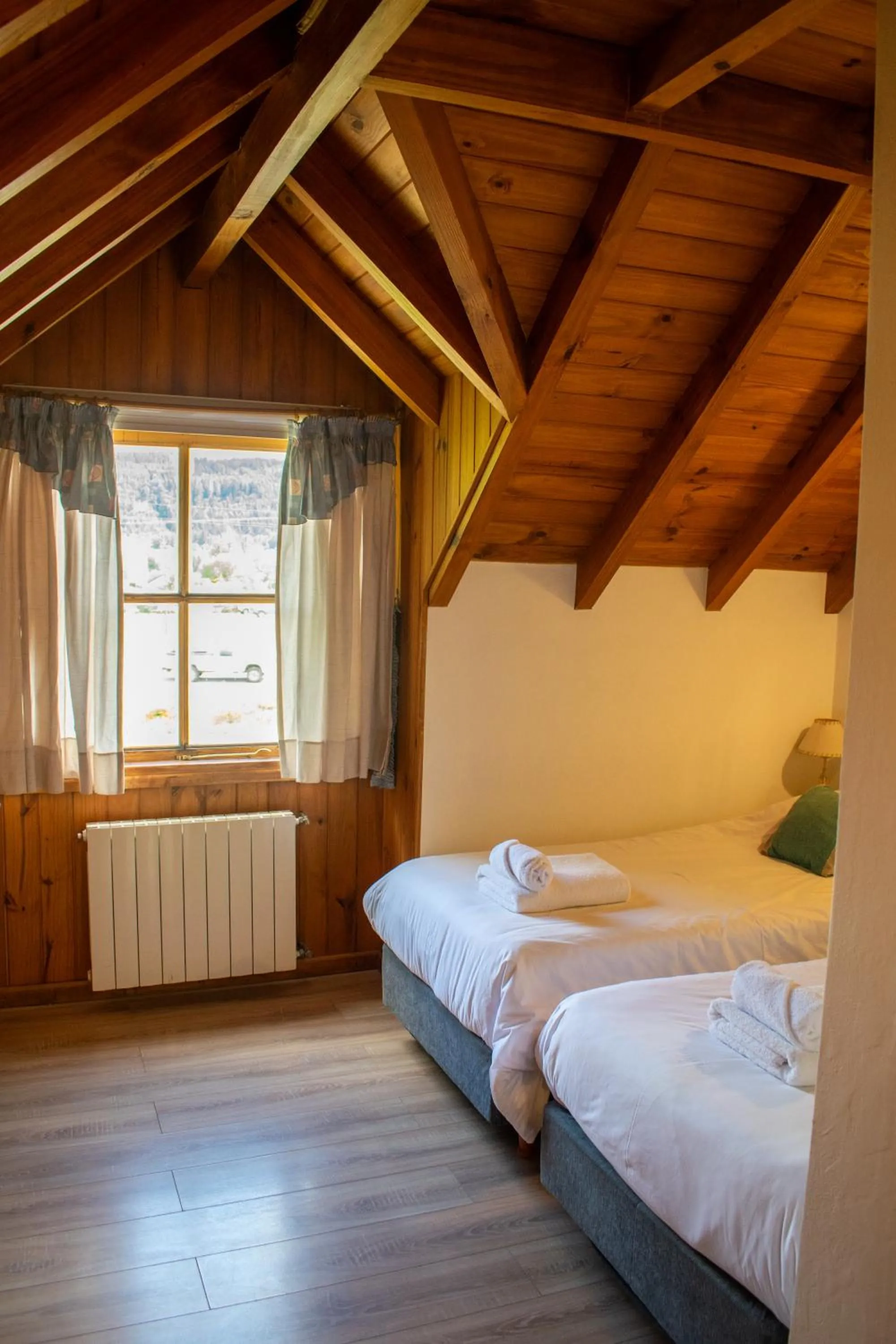 Bed in Hosteria y Cabañas Posada Quinen