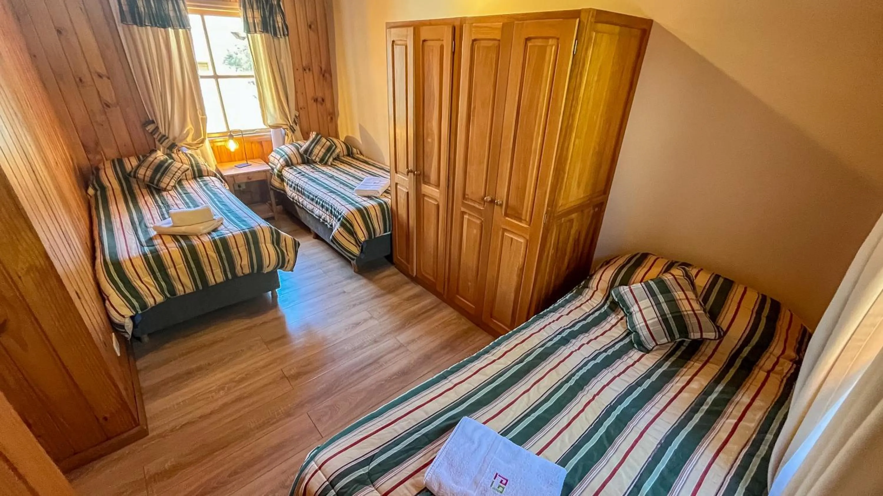 Bed in Hosteria y Cabañas Posada Quinen