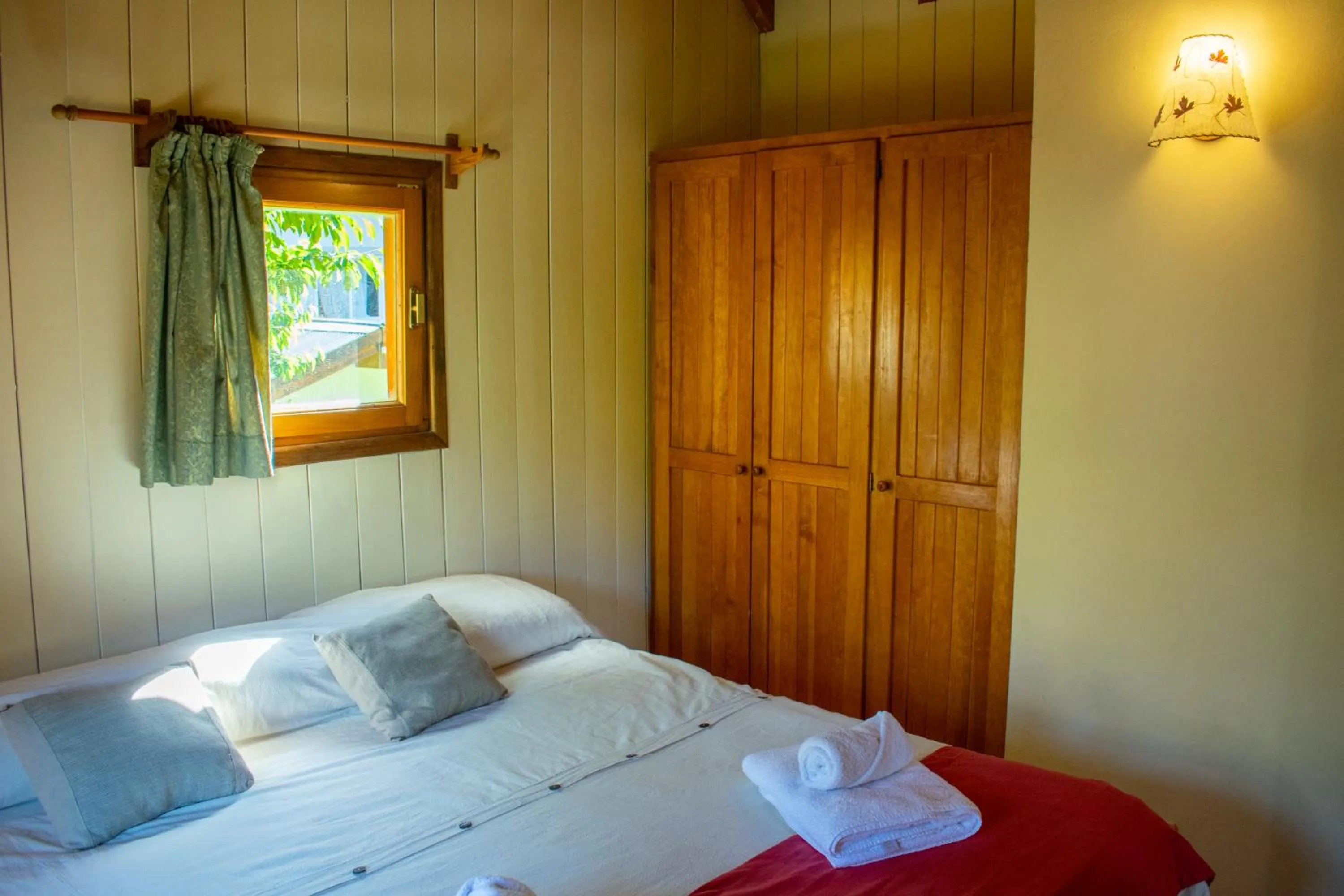 Bed in Hosteria y Cabañas Posada Quinen