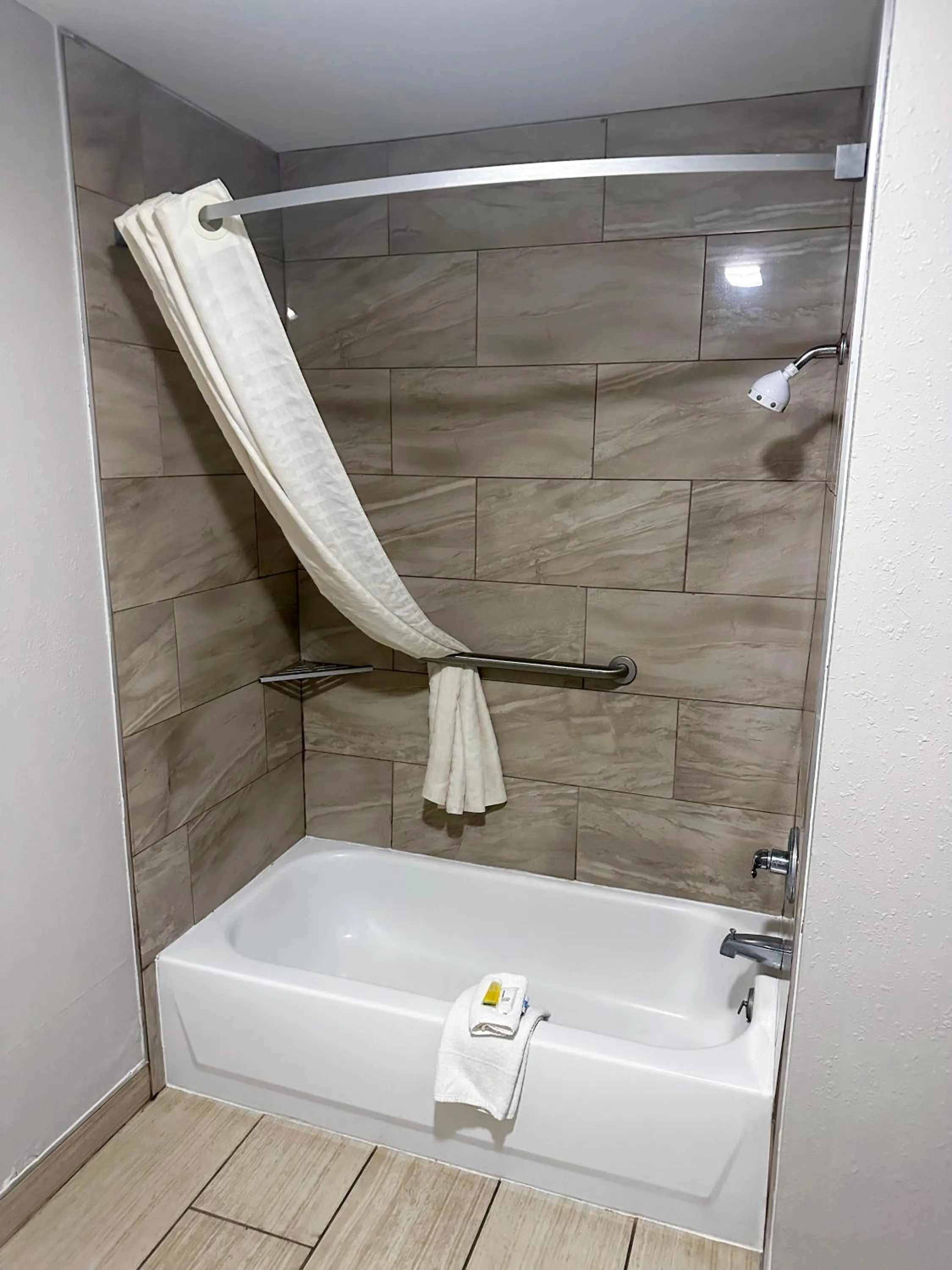 Bathroom in Days Inn & Suites by Wyndham Opelousas