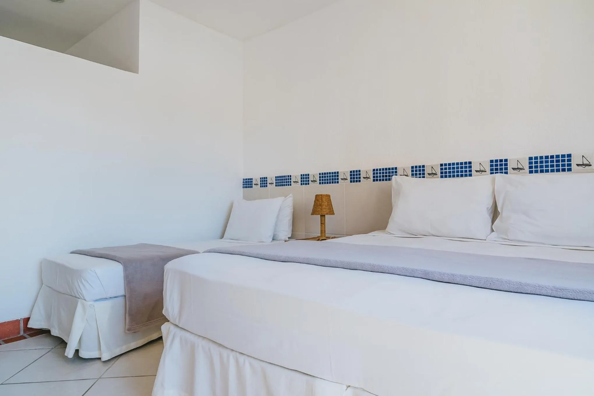 Bed in Pousada Porto Fino