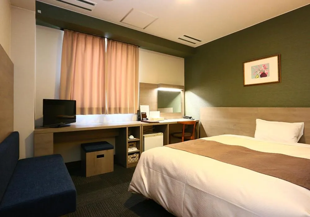 Bed in Hotel New Shizuoka