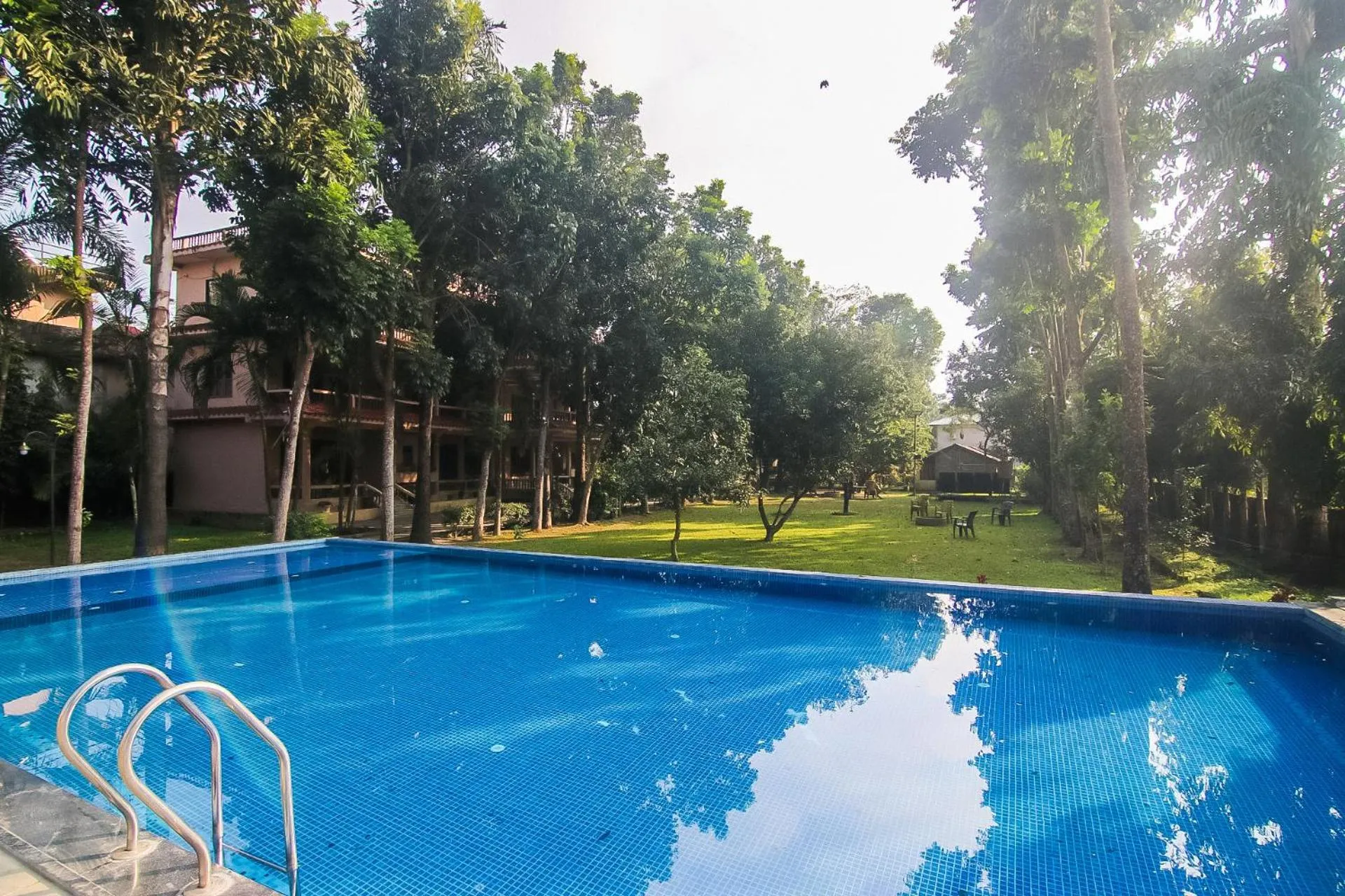 Swimming pool in Chitwan Forest Resort with swimming pool , Chitwan National Park