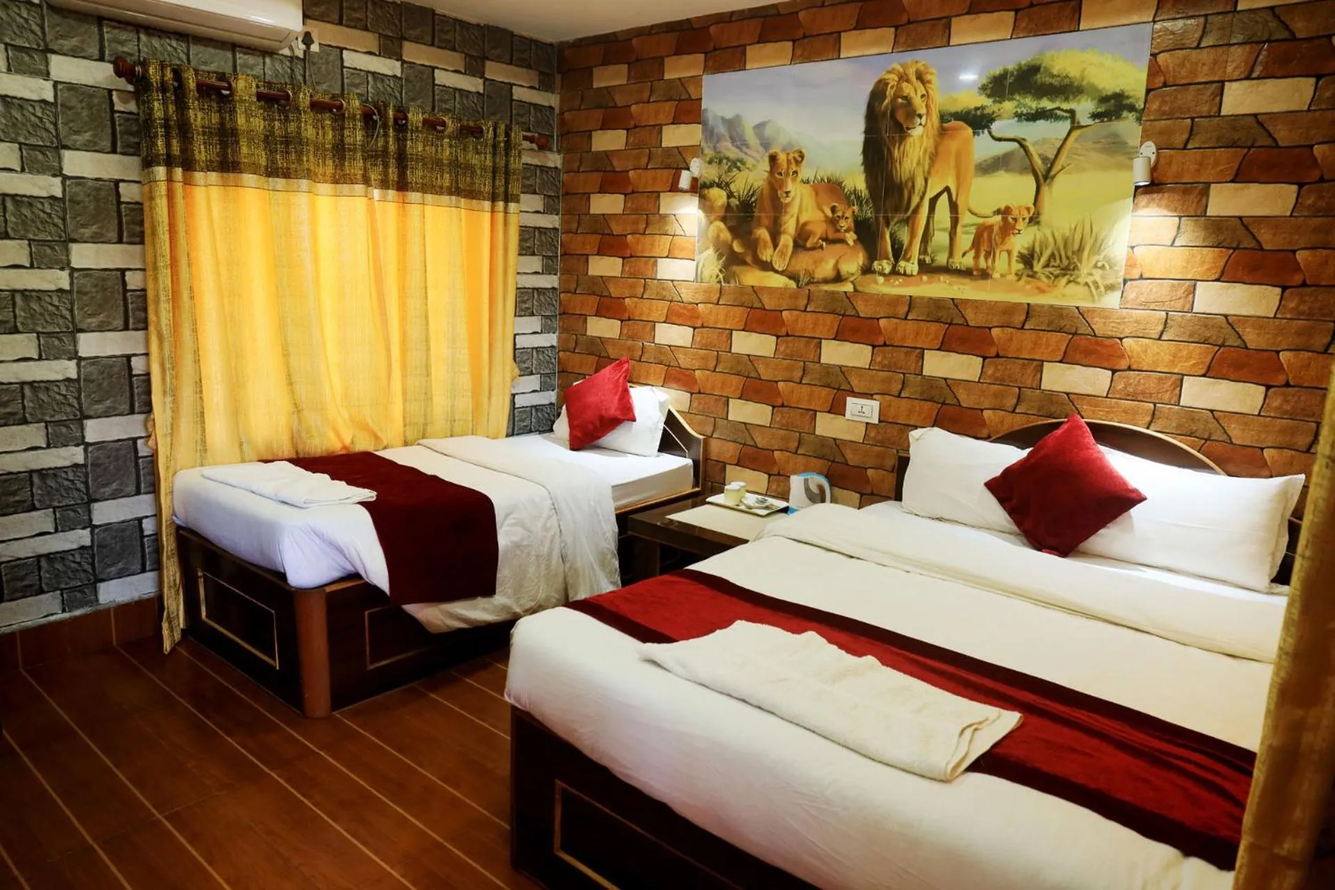 Bed in Chitwan Forest Resort with swimming pool , Chitwan National Park