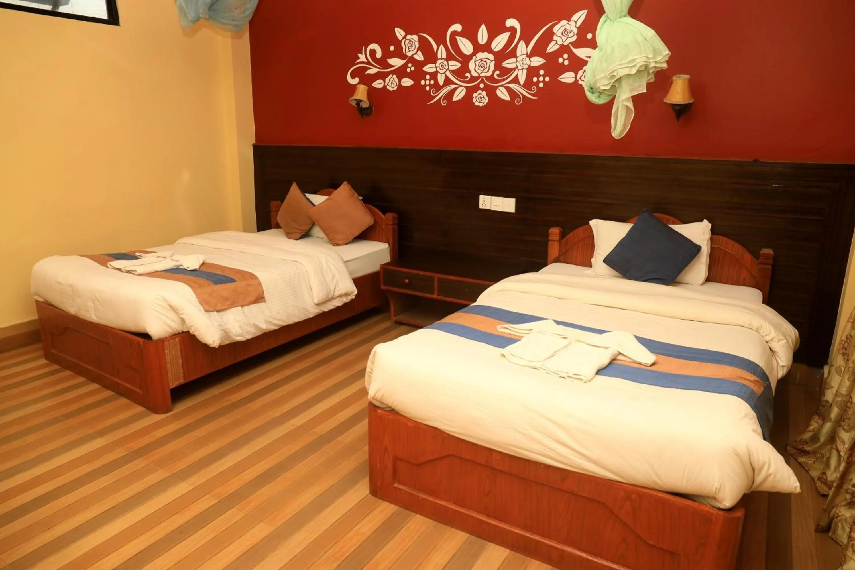 Bedroom, Bed in Chitwan Forest Resort with swimming pool , Chitwan National Park