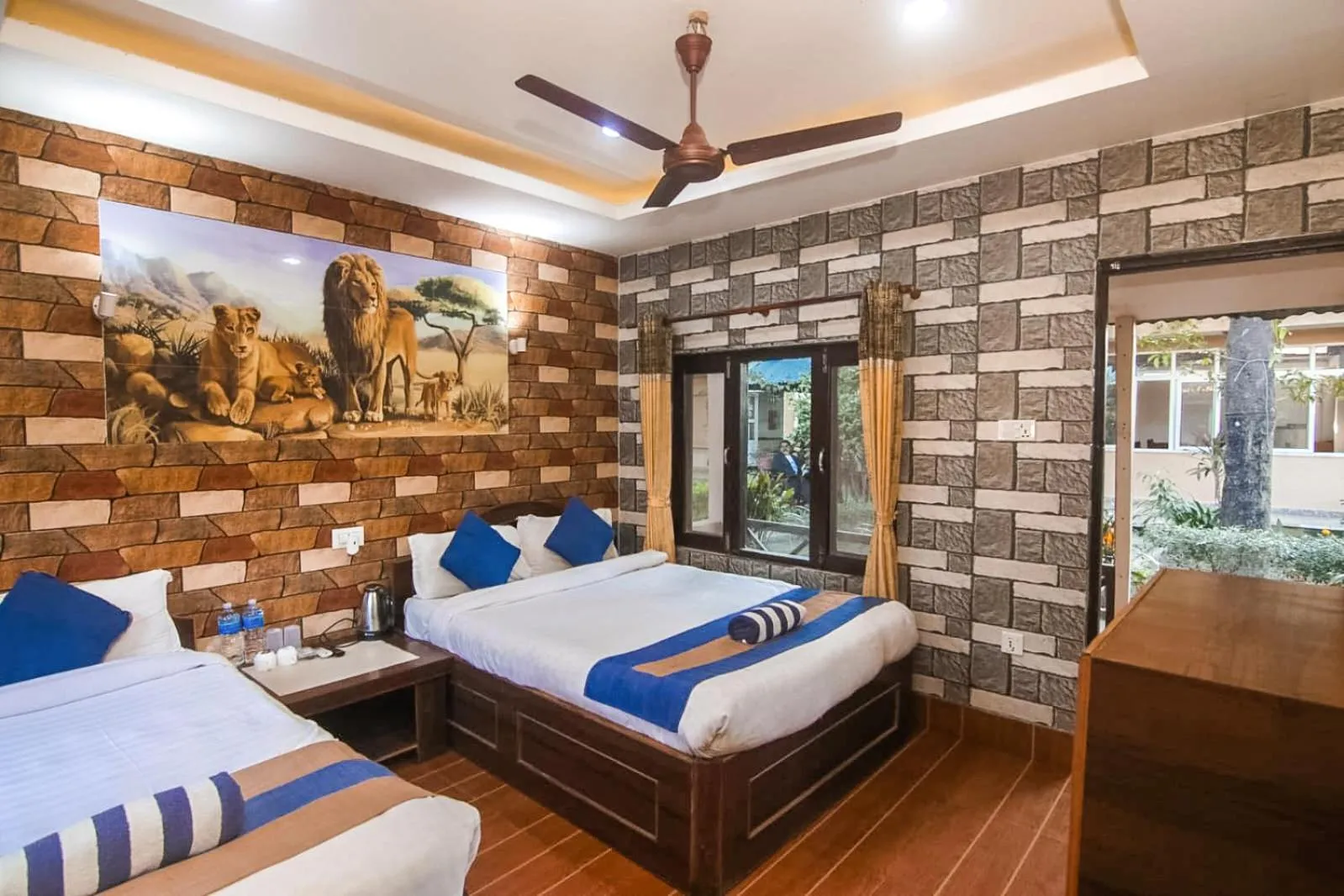 Garden view, Bed in Chitwan Forest Resort with swimming pool , Chitwan National Park