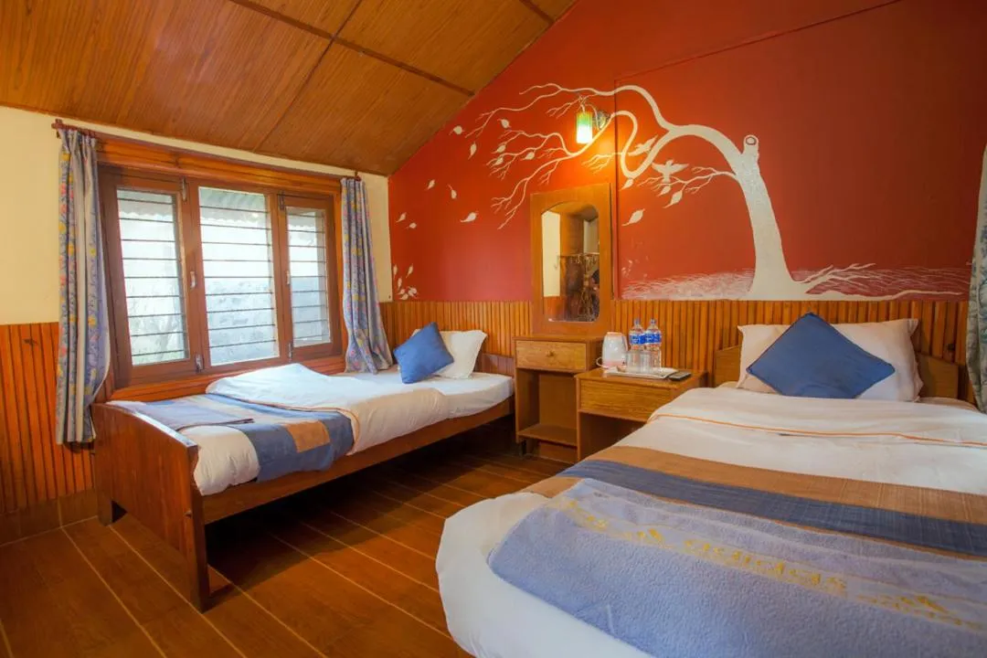 Photo of the whole room, Bed in Chitwan Forest Resort with swimming pool , Chitwan National Park