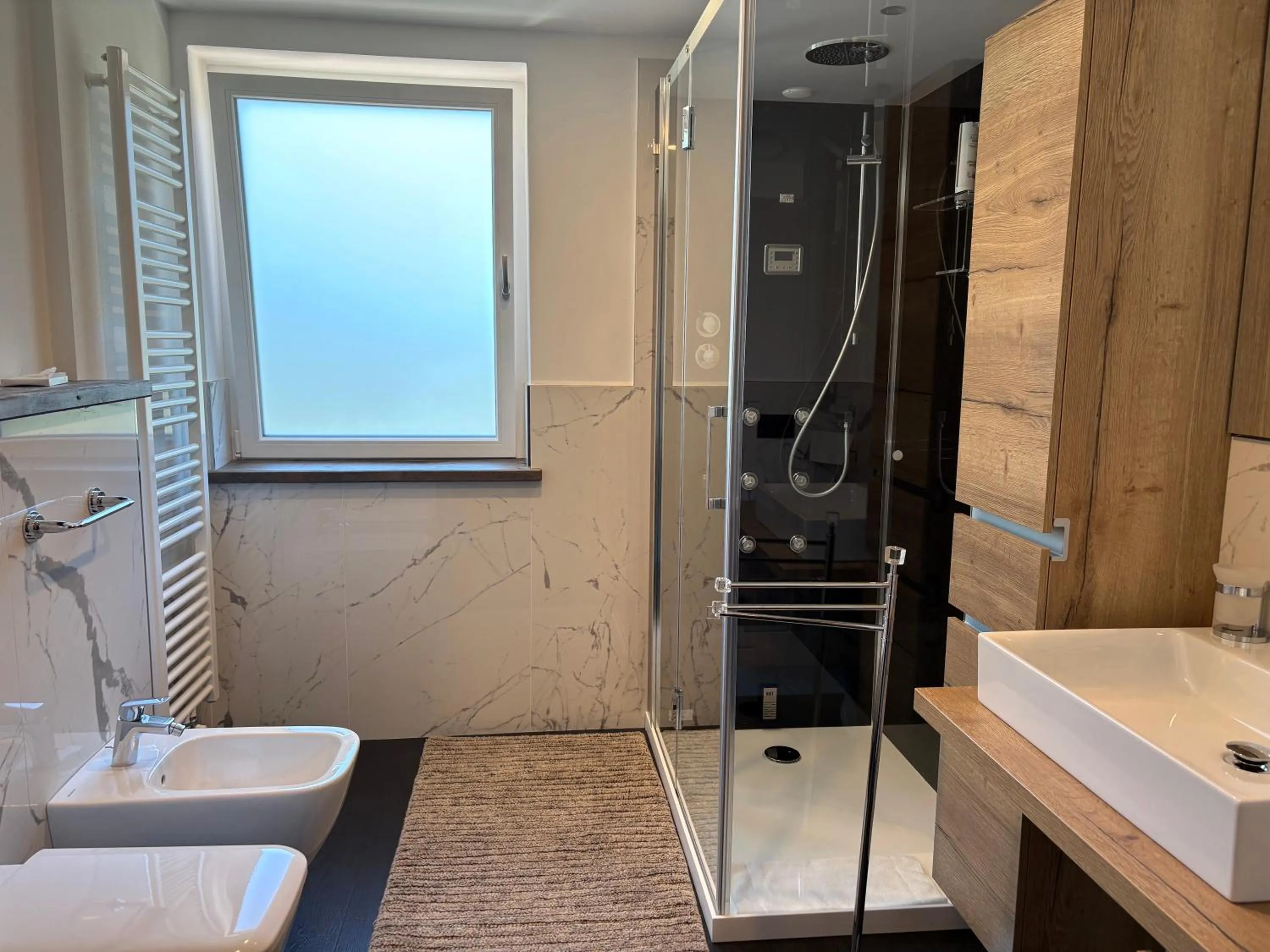 Bathroom in Alpen Family Hotel Someda