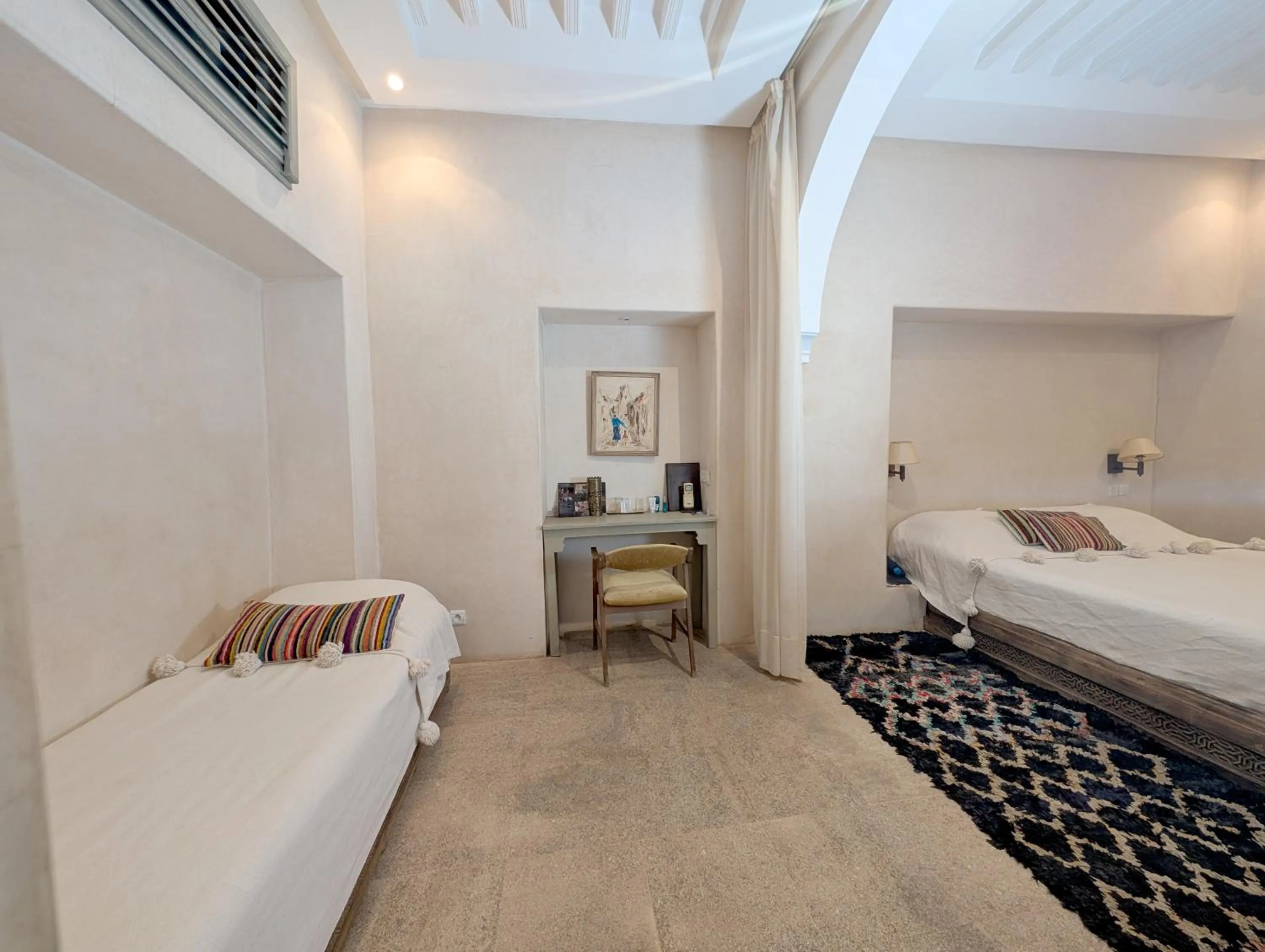 Bed in Riad Slitine & Spa
