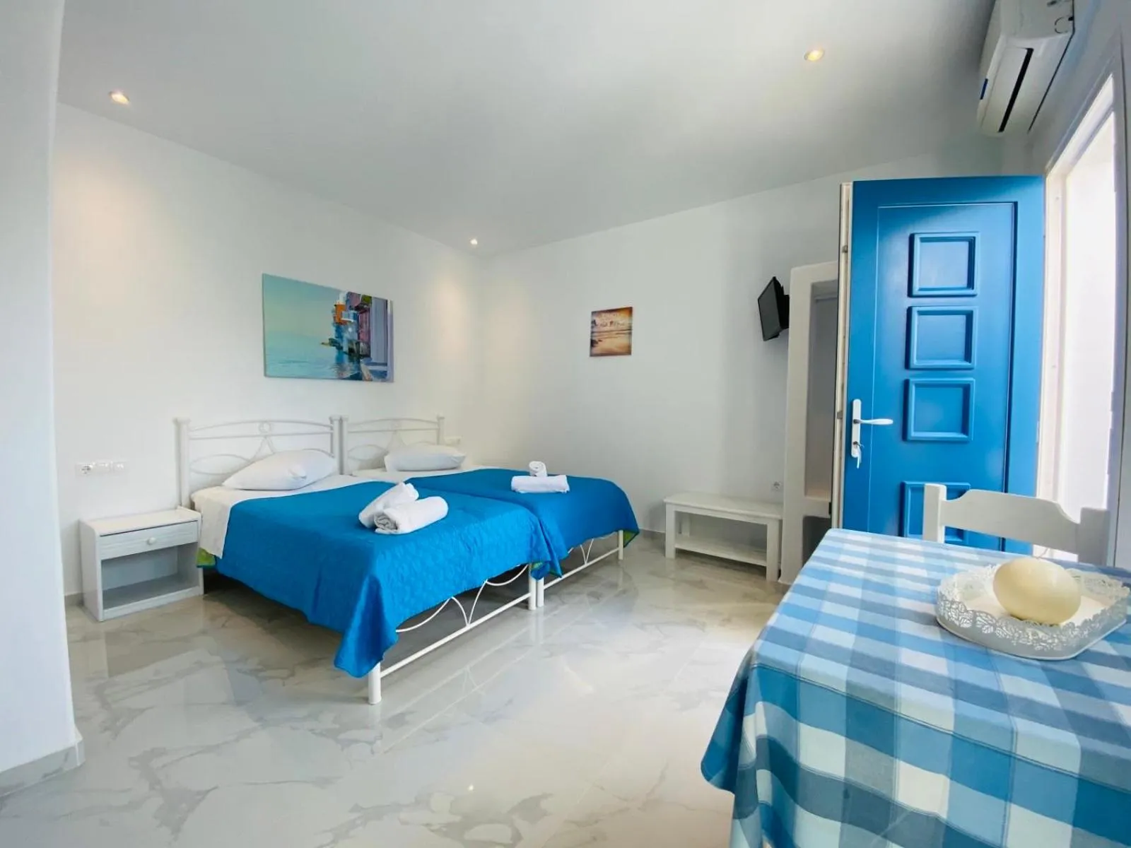 Bed in Anemos Hotel & Apartments