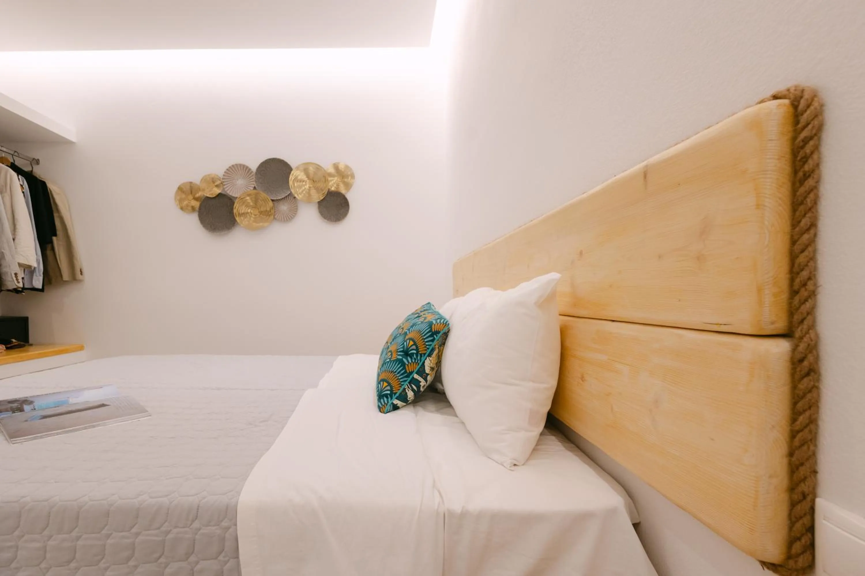 Bed in Anemos Hotel & Apartments