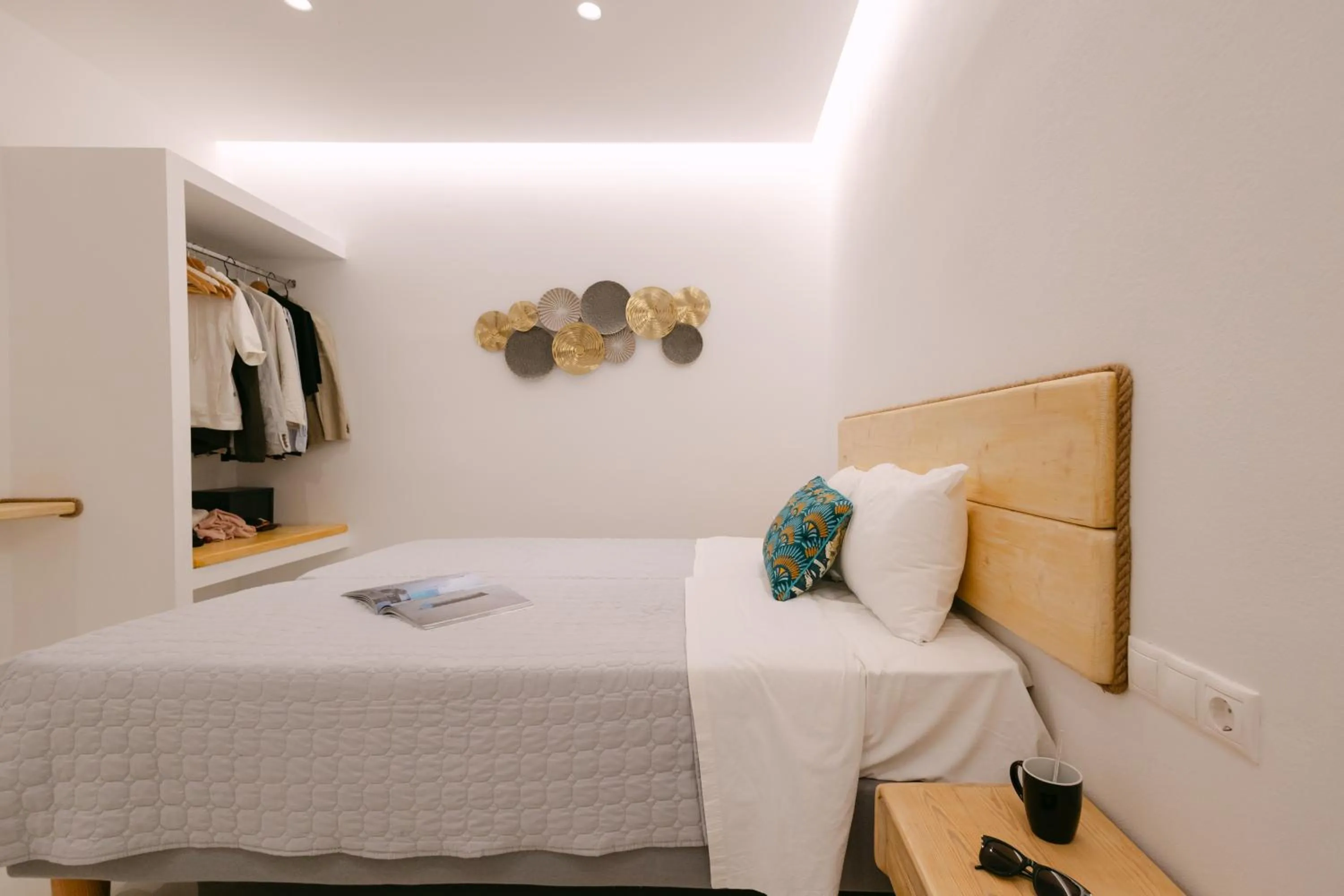 Bed in Anemos Hotel & Apartments