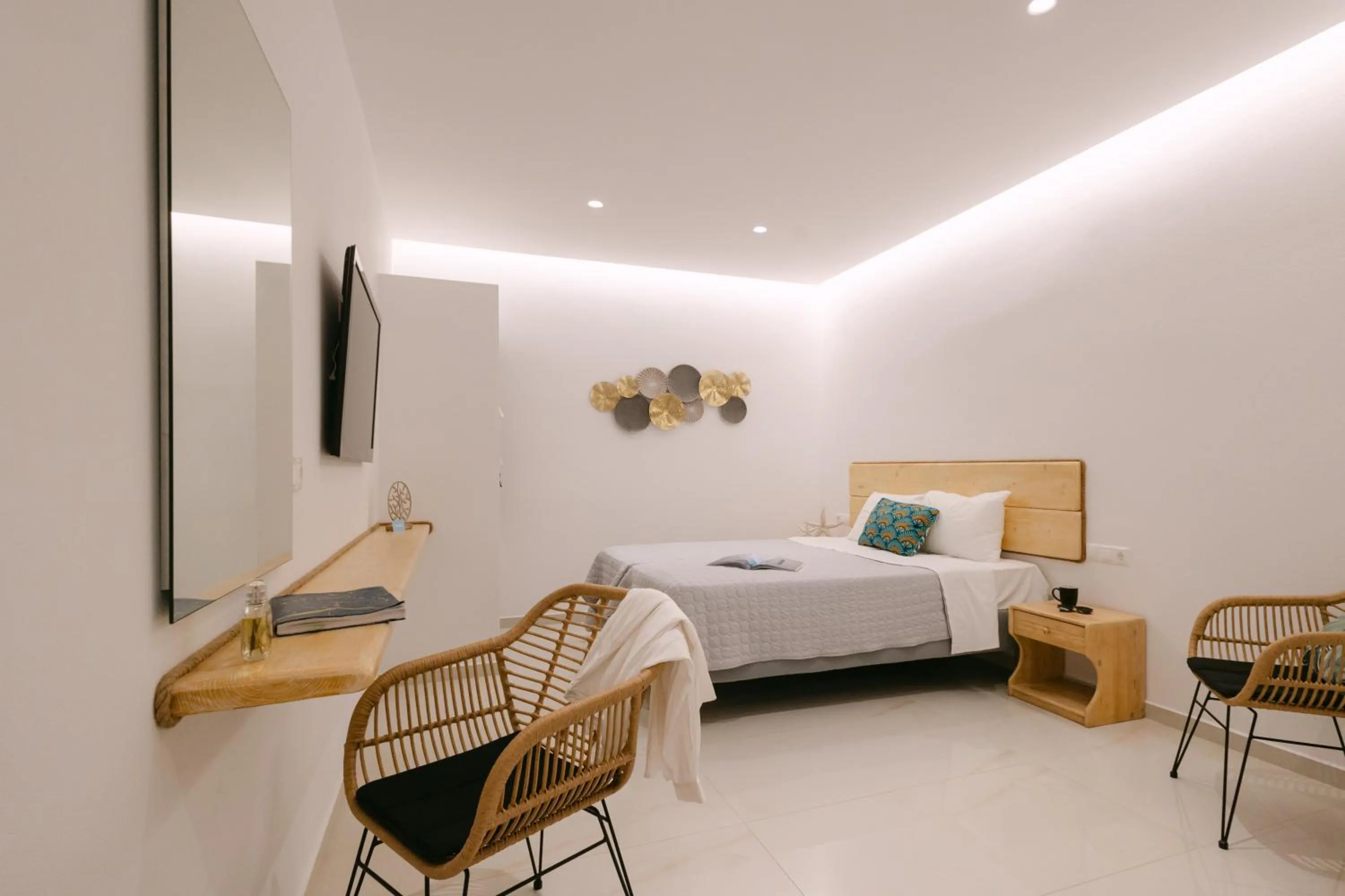 Bed in Anemos Hotel & Apartments