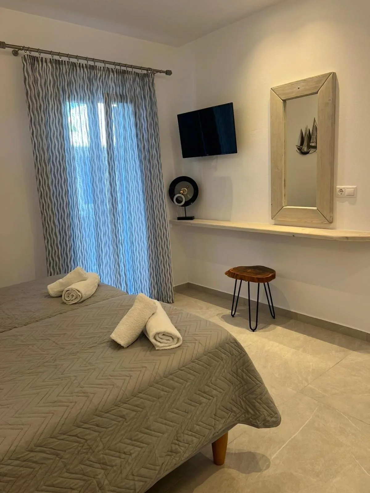 Bed in Anemos Hotel & Apartments