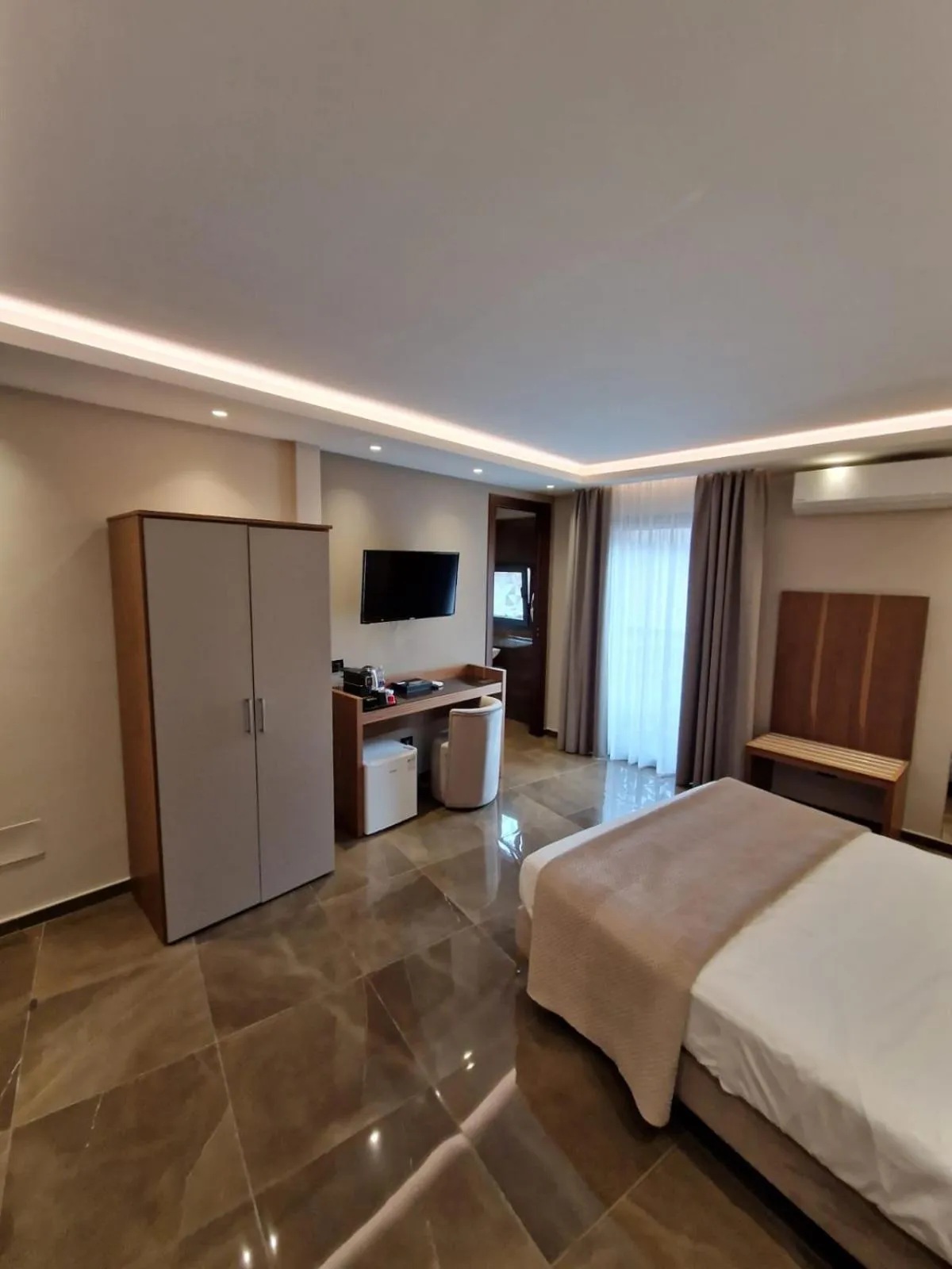 TV and multimedia, Bed in Beatus Suites And Rooms B&B