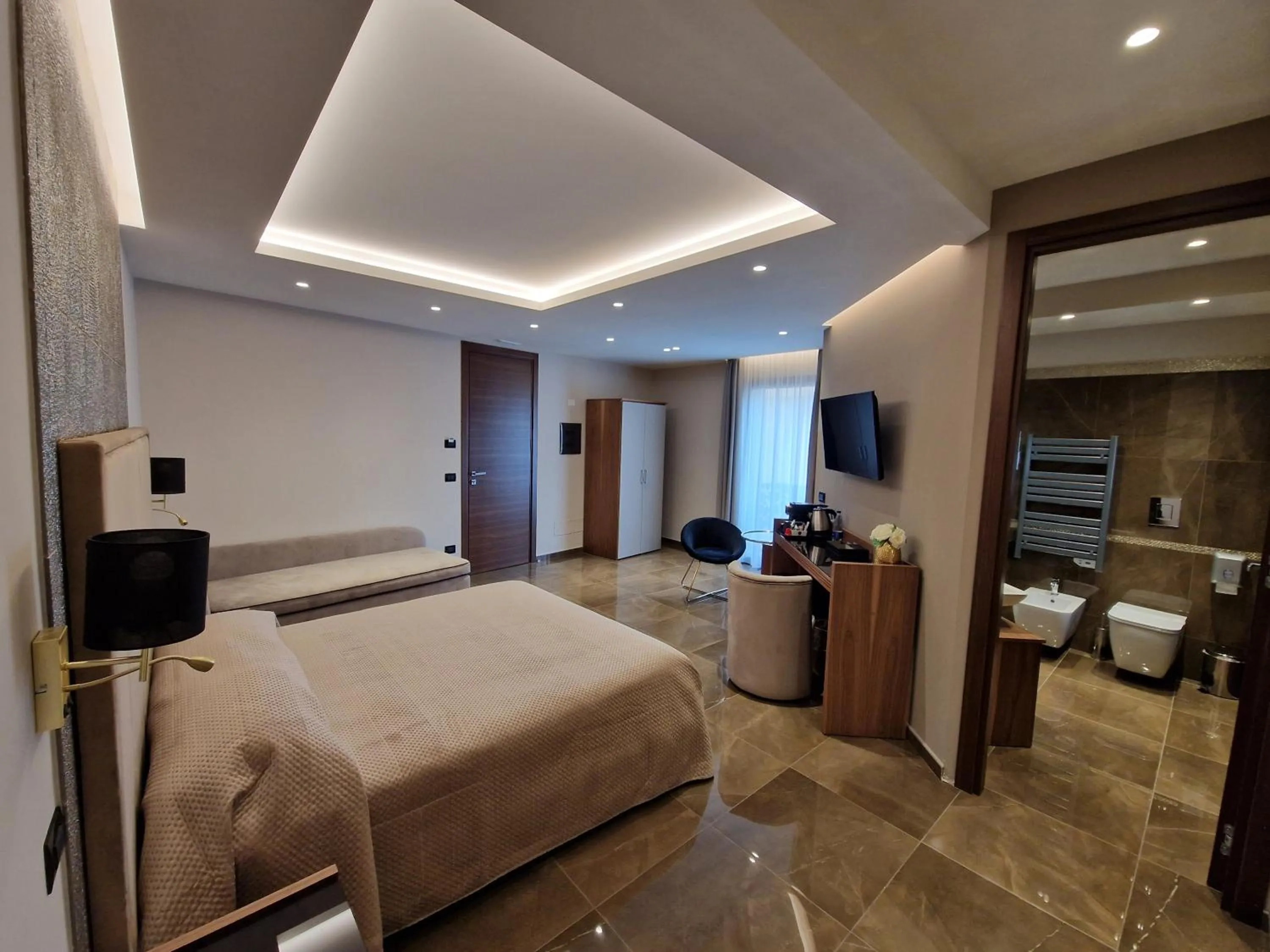 Bed in Beatus Suites And Rooms B&B