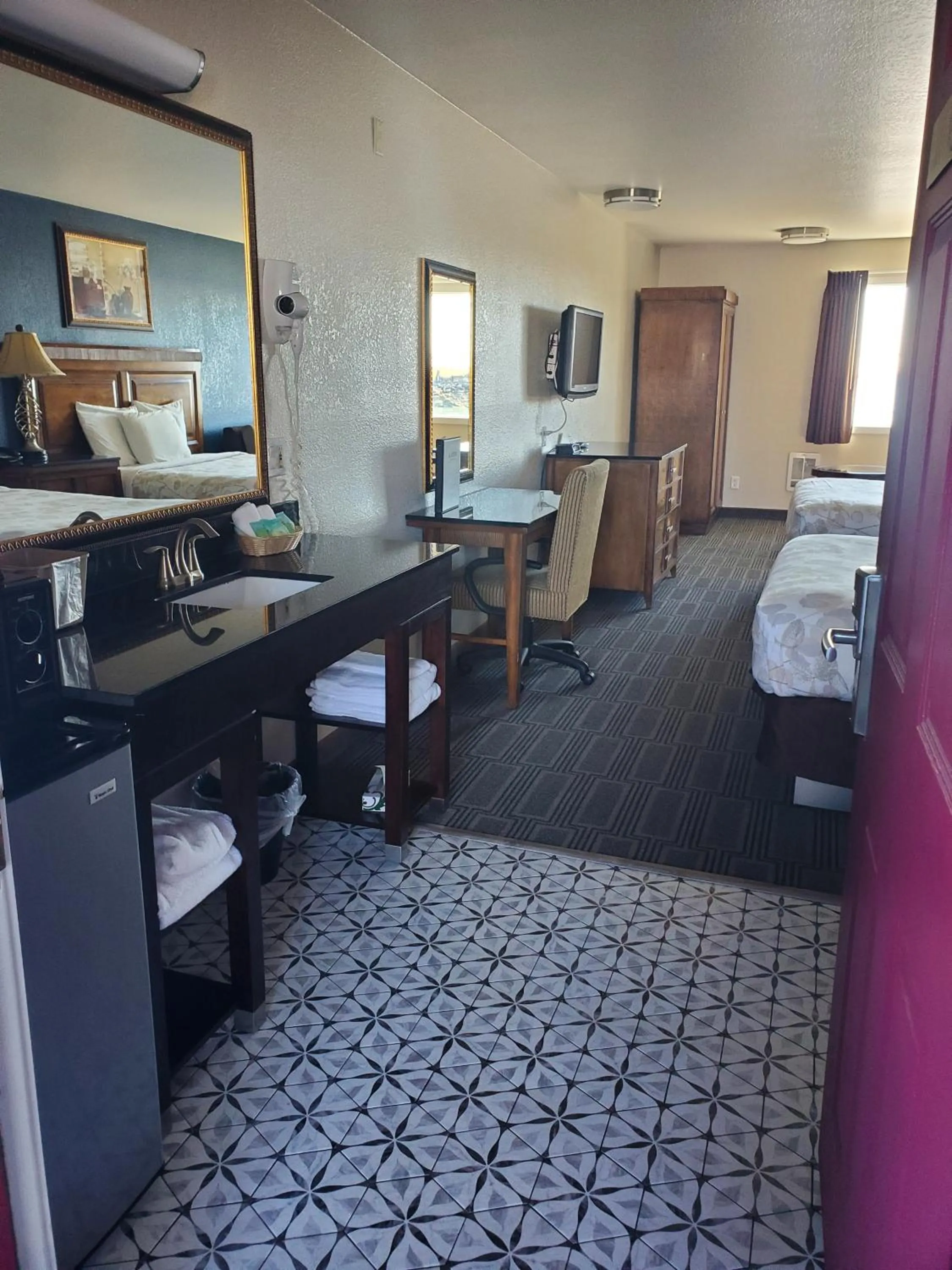 Bed in Aladdin Motor Inn