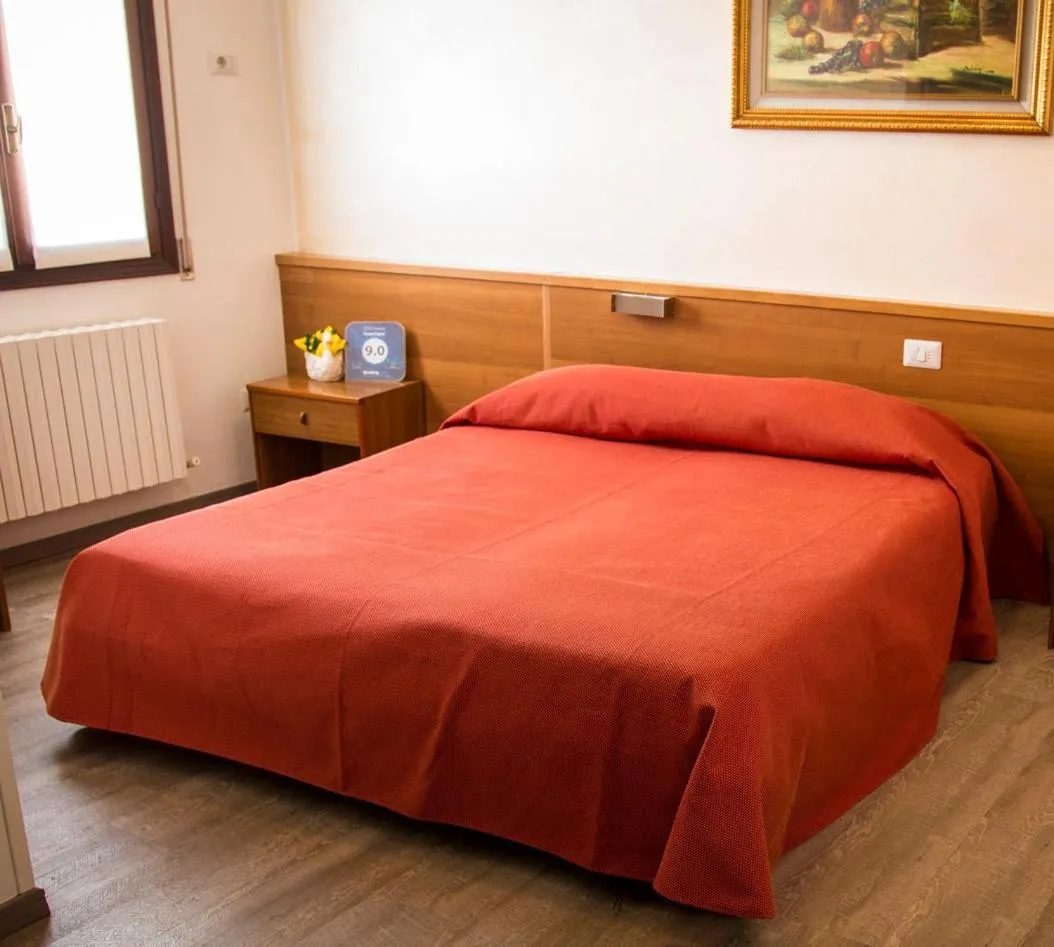 Bed in Hotel Ristorante Cigno - Camere and Aparthotel