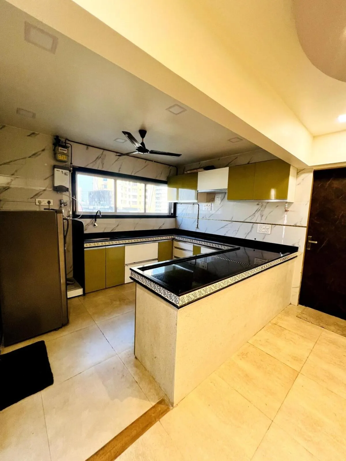 Kitchen or kitchenette in Pinaki Comfort Stay