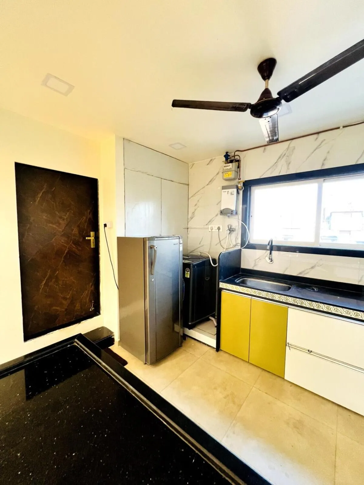Kitchen or kitchenette in Pinaki Comfort Stay