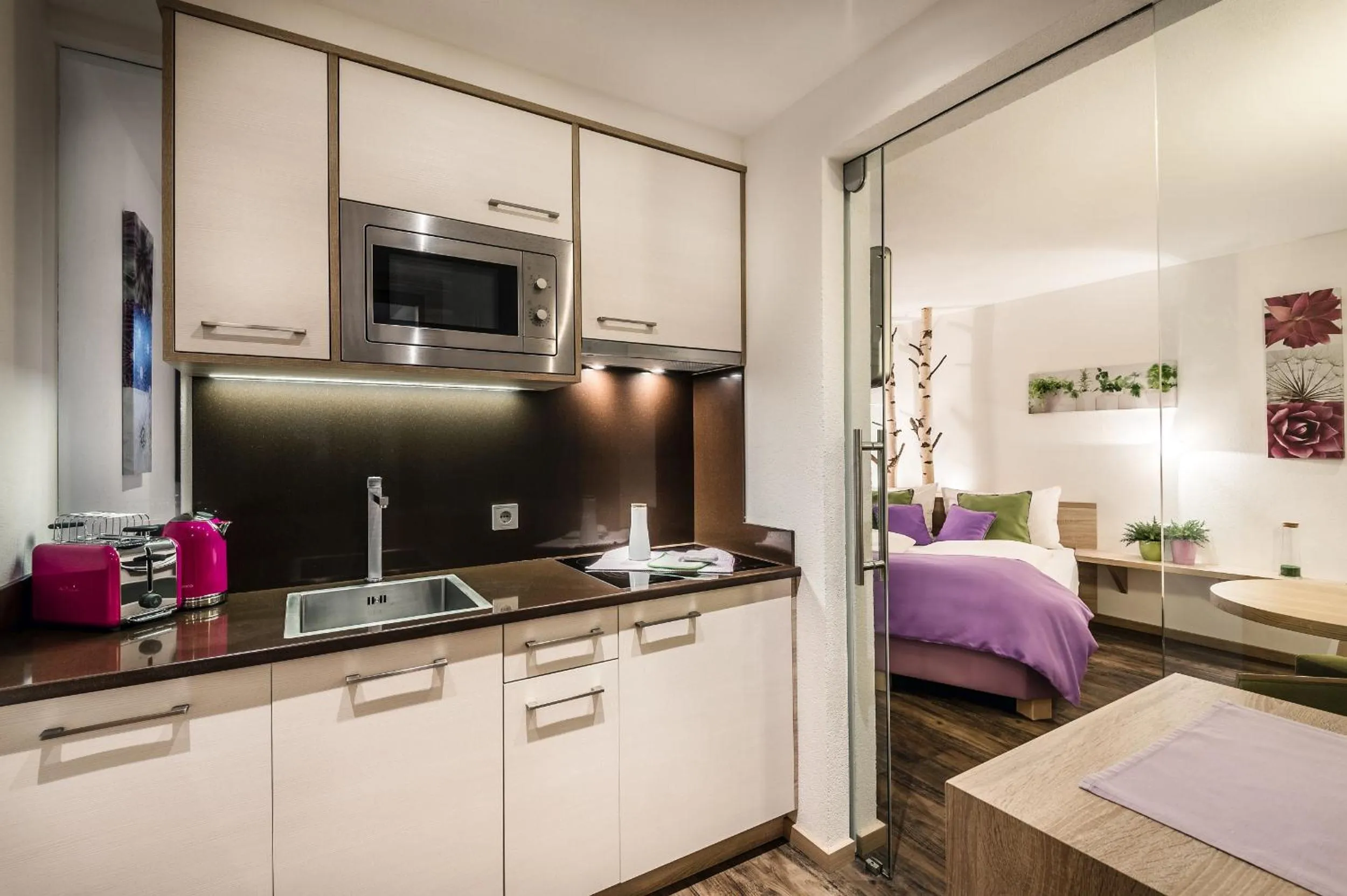 Kitchen or kitchenette, Bed in Taela Apartments
