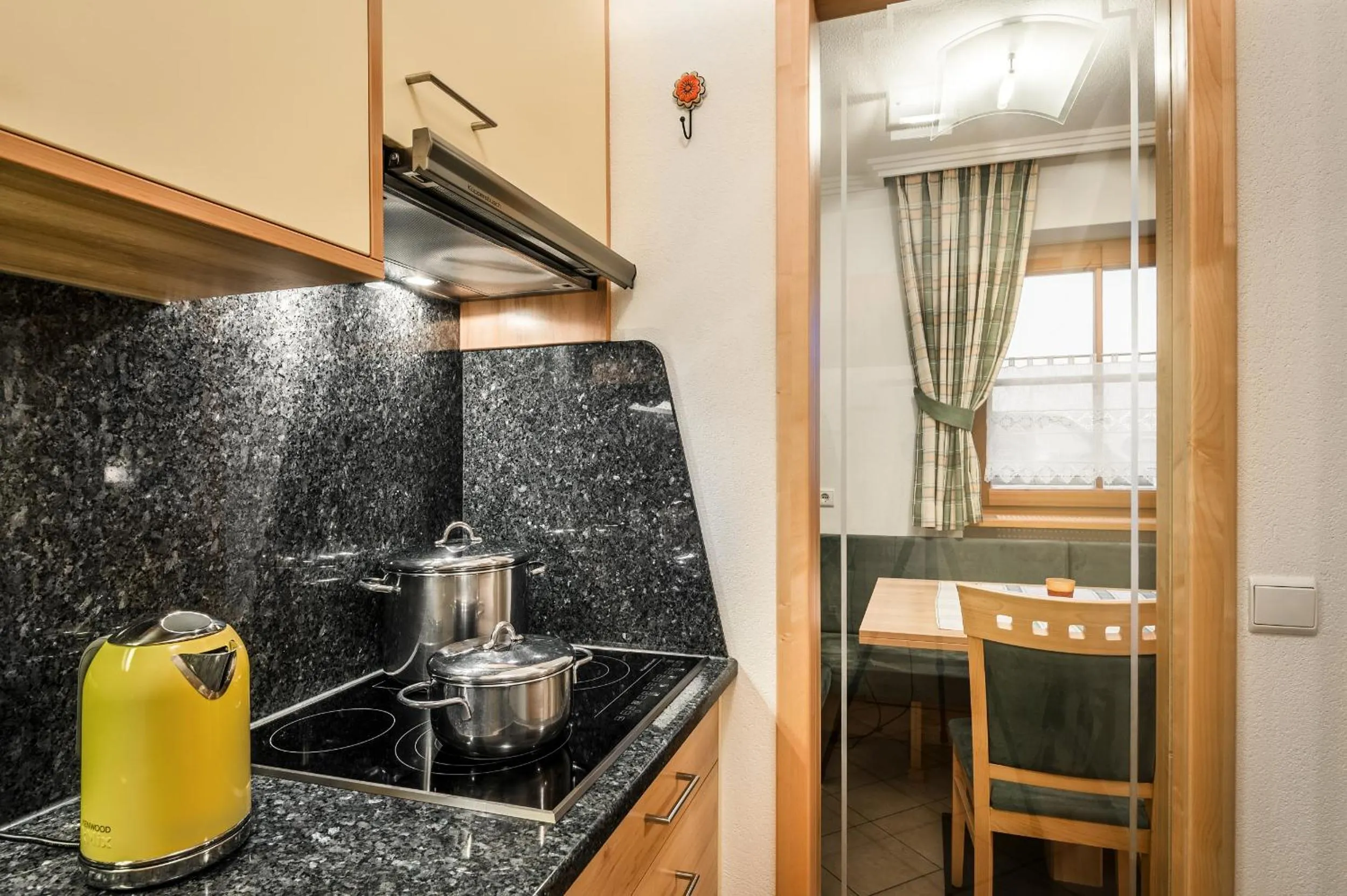 Kitchen or kitchenette in Taela Apartments