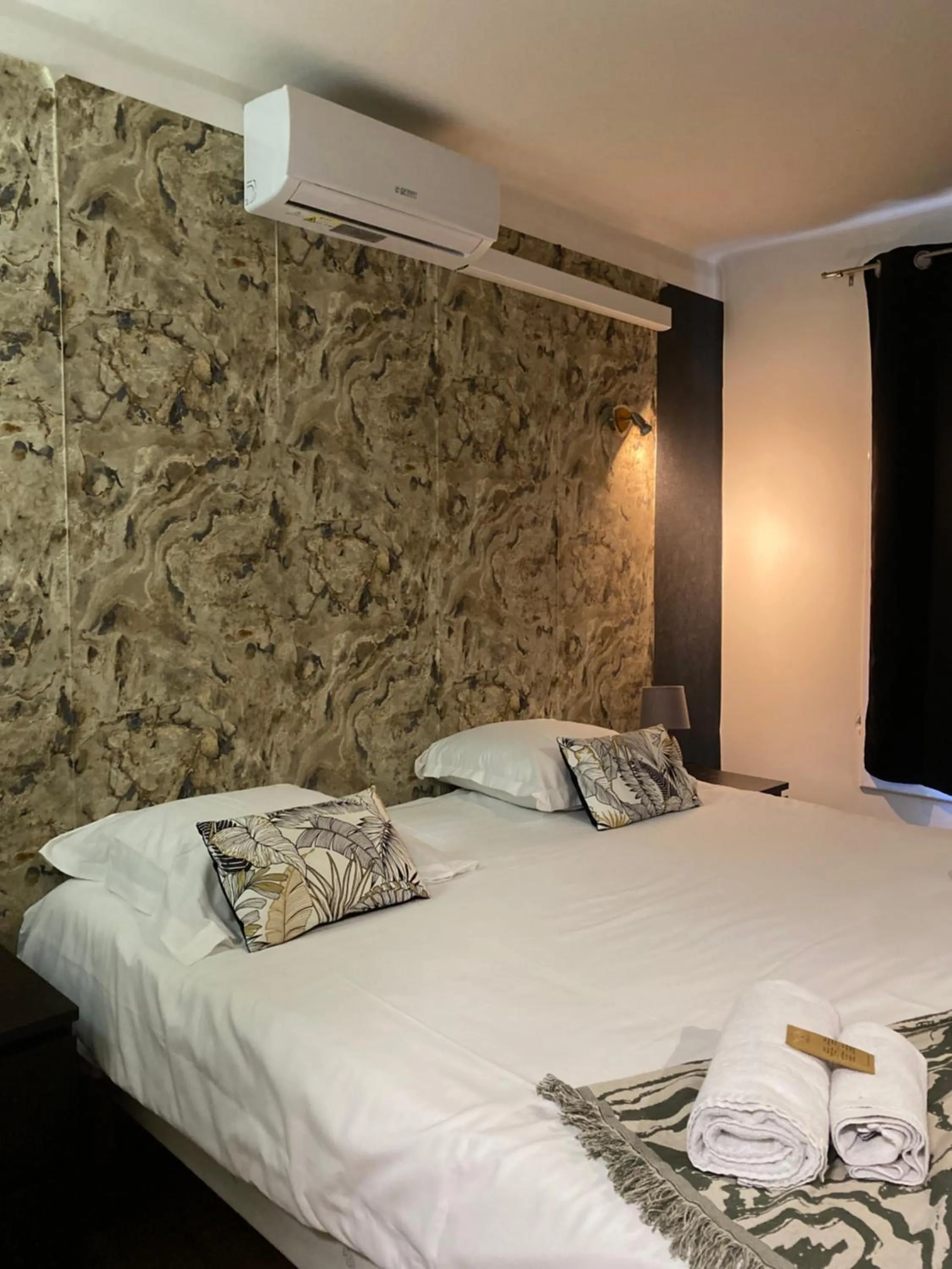 Bed in Hôtel des Beaux Arts