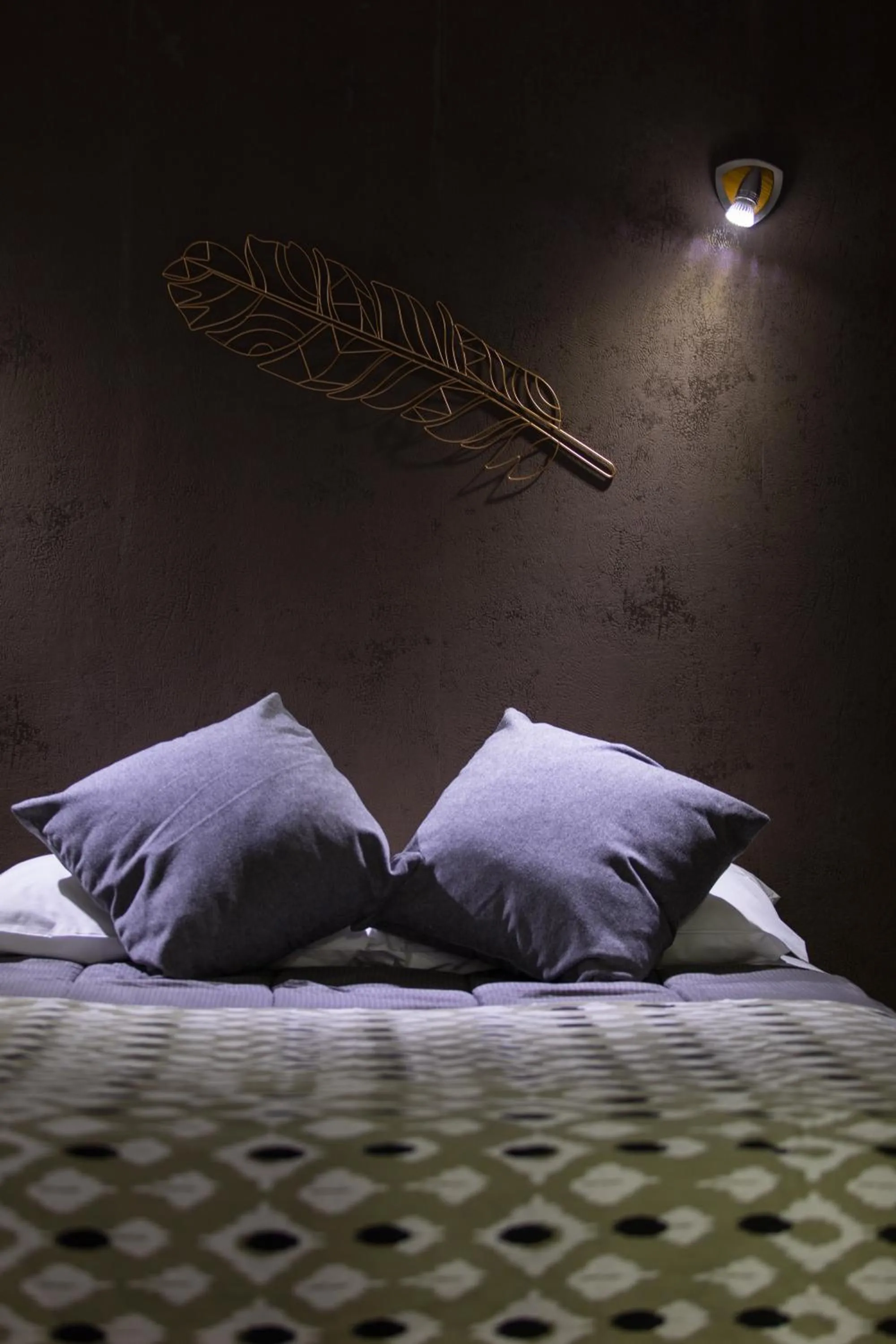 Bed in Hôtel des Beaux Arts