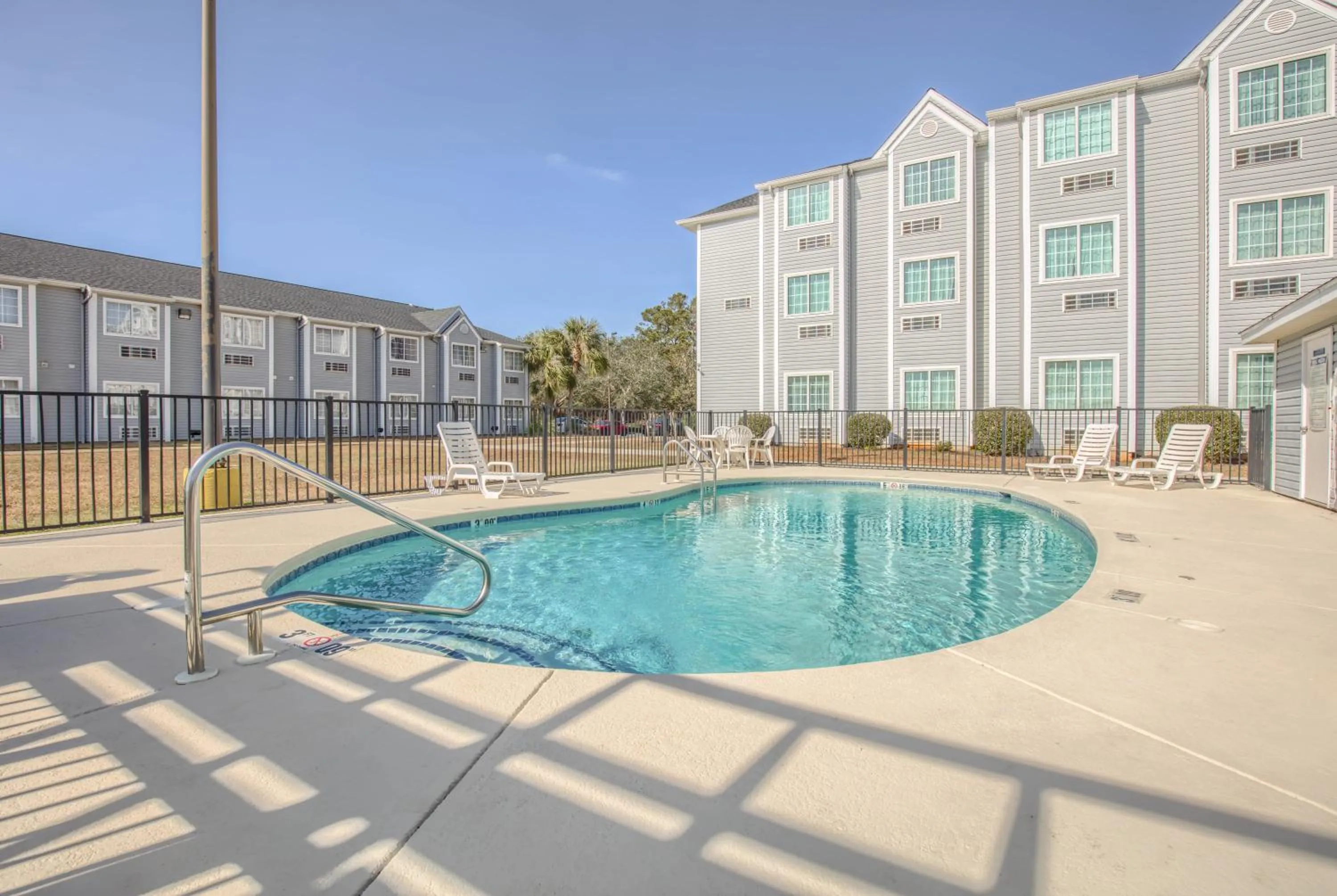 Swimming pool in Microtel Inn & Suites by Wyndham Gulf Shores