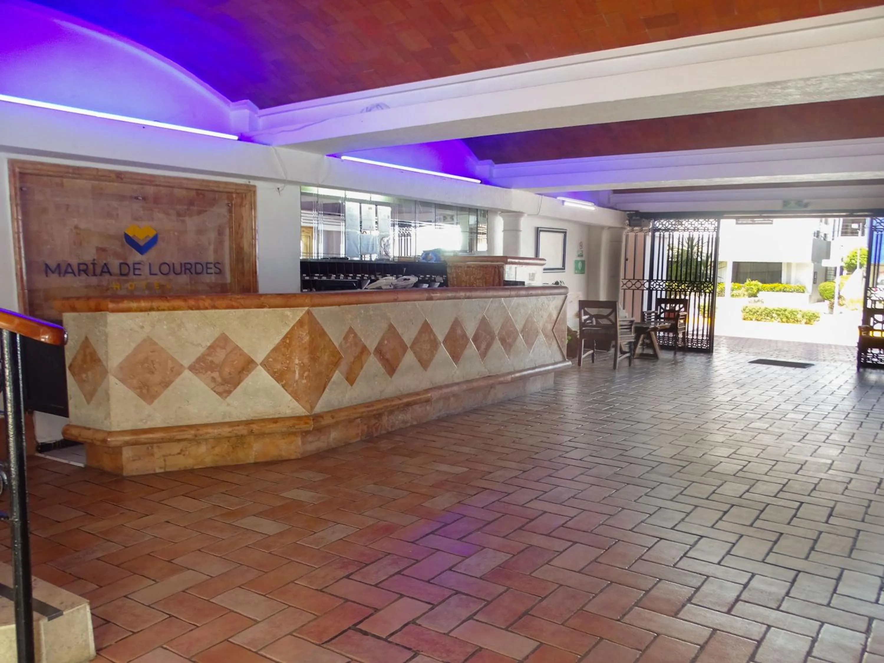 Lobby or reception in Hotel Maria de Lourdes