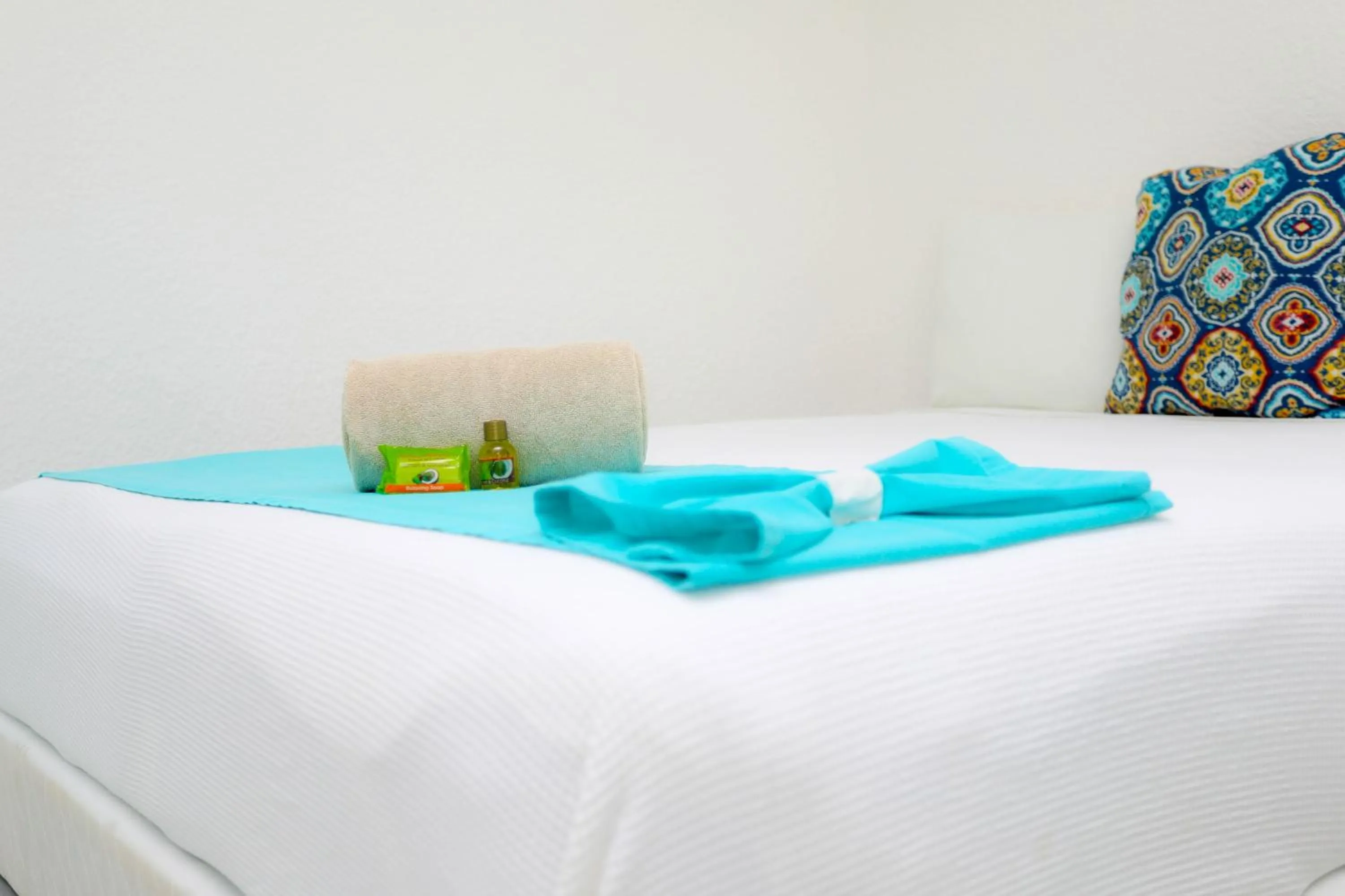 towels, Bed in Hotel Maria de Lourdes