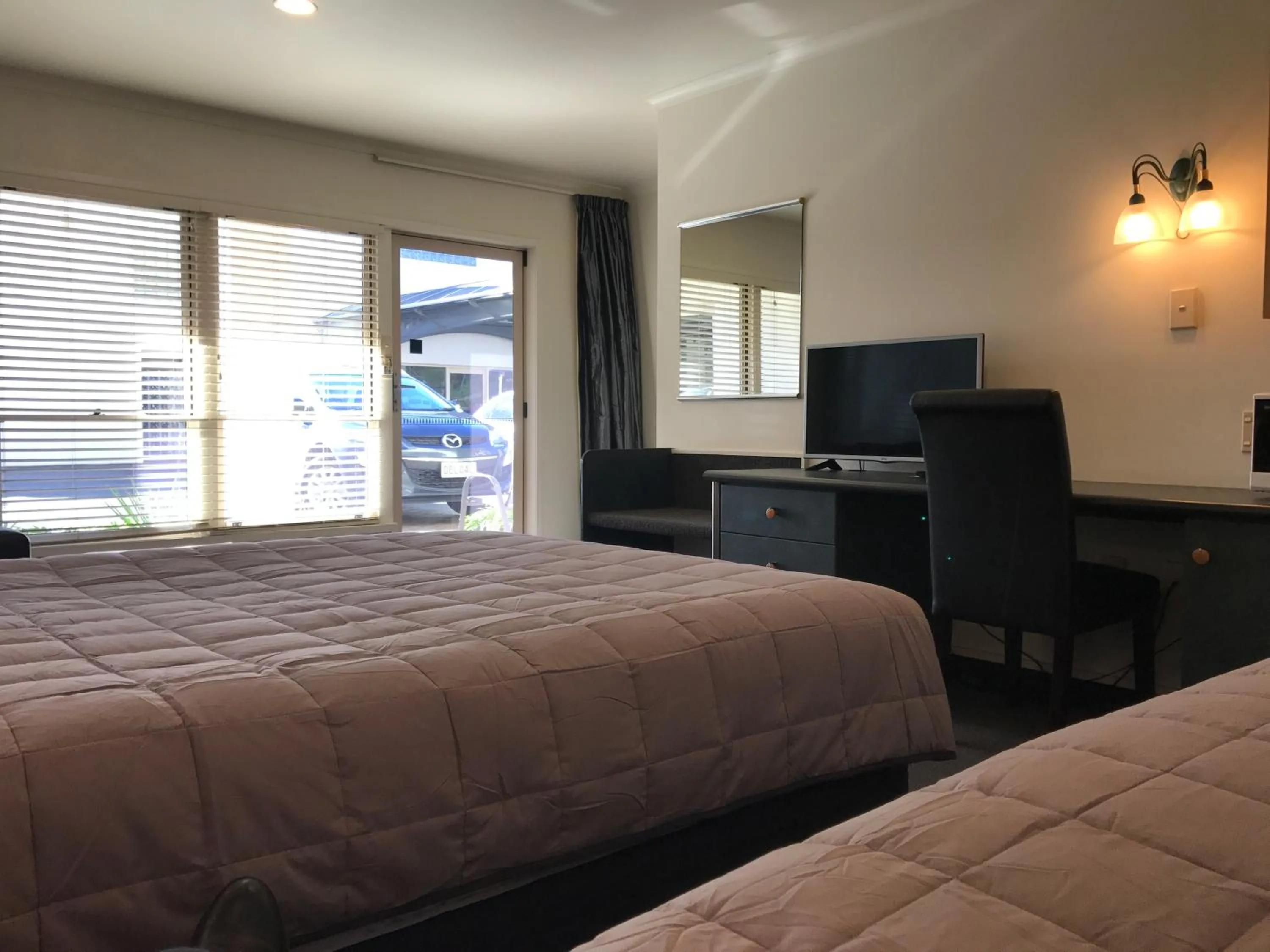 Bed in Pacific Harbour Motor Inn