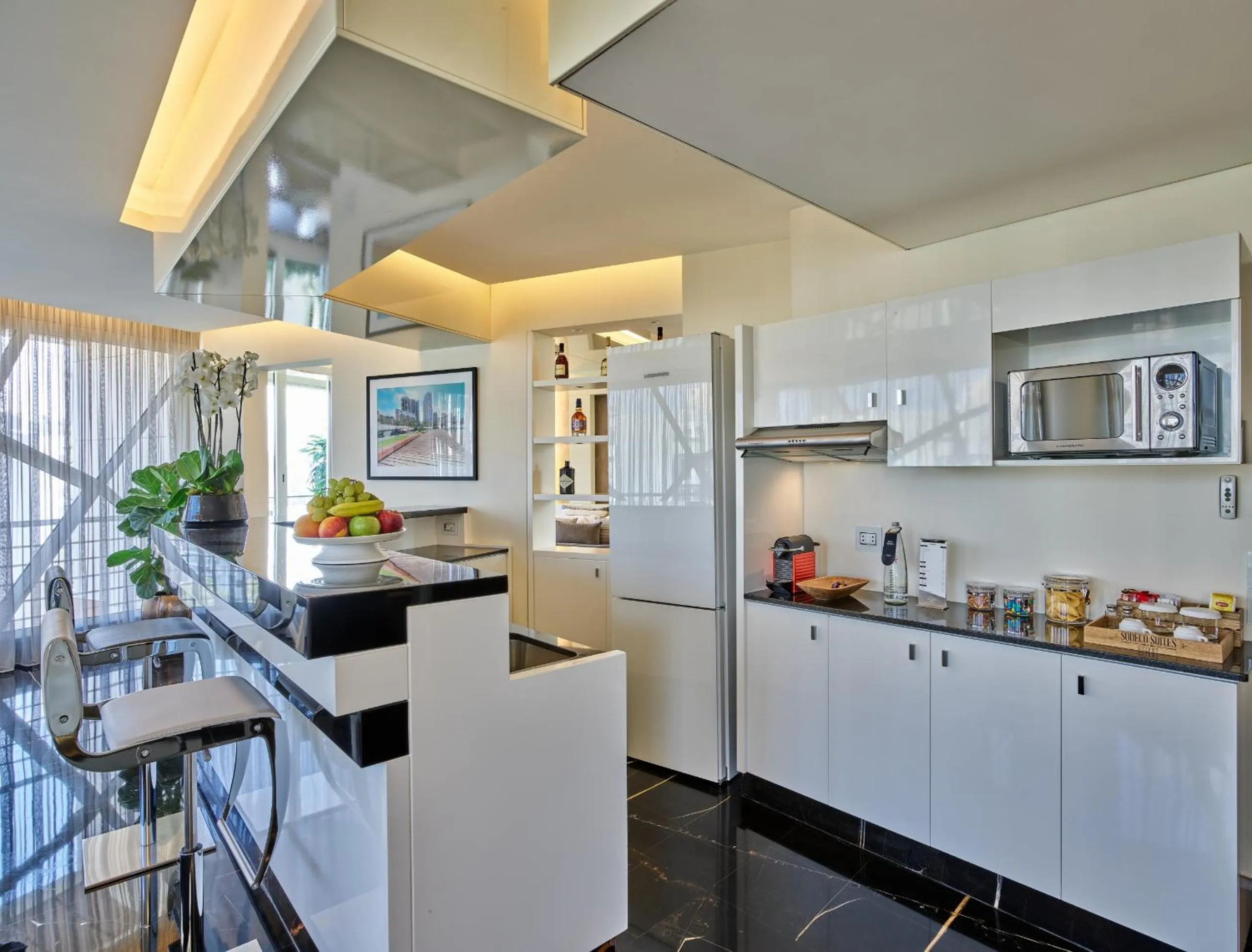 Kitchen or kitchenette in Sodeco Suites