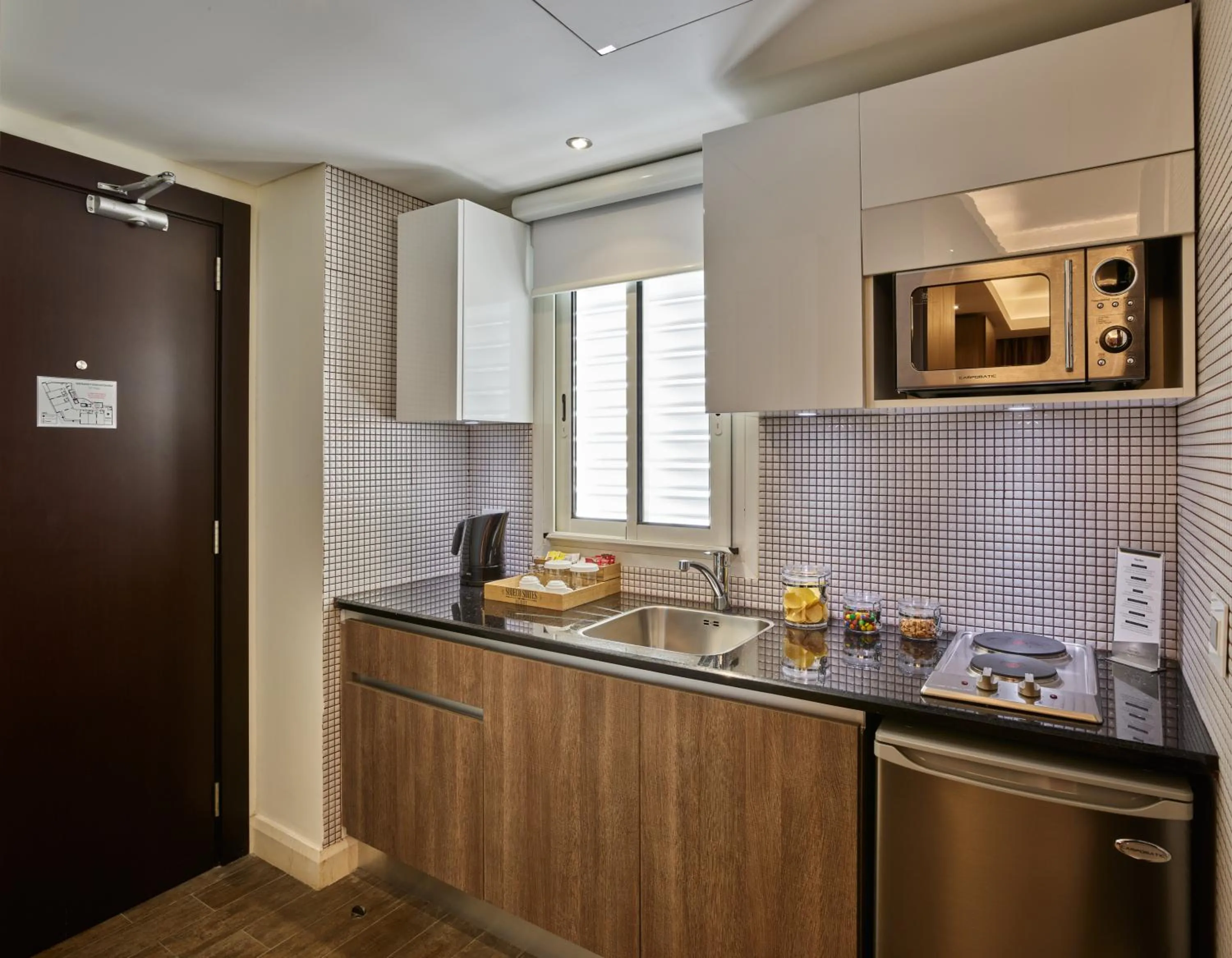 Kitchen or kitchenette in Sodeco Suites
