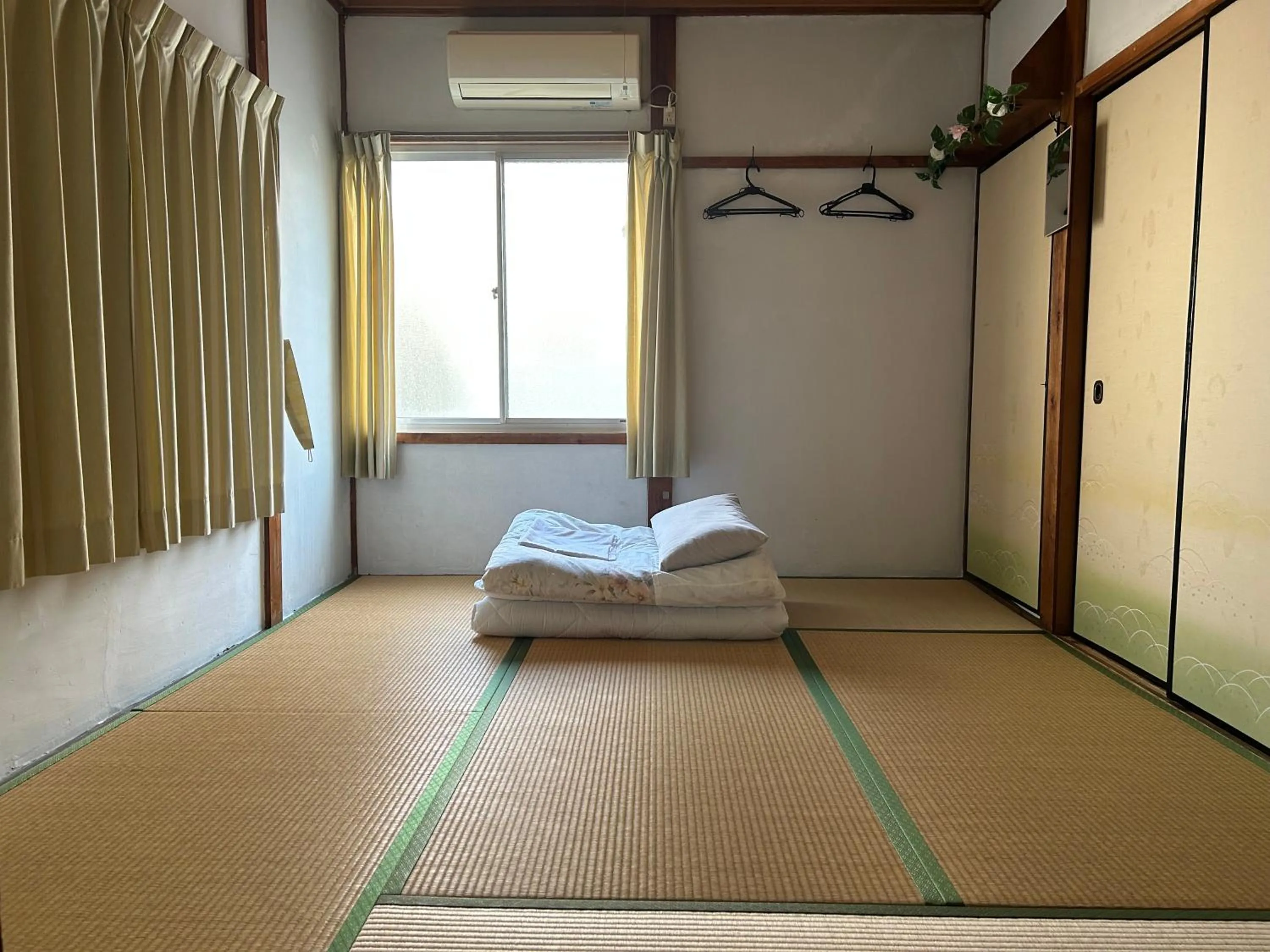 Bed in Tentsuku Guest House