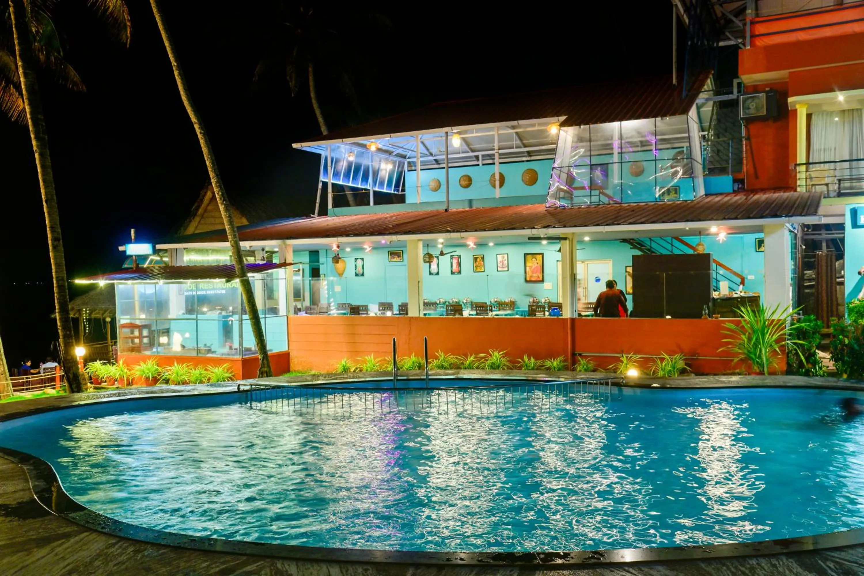Swimming pool in Krishnatheeram Ayur Holy Beach Resorts
