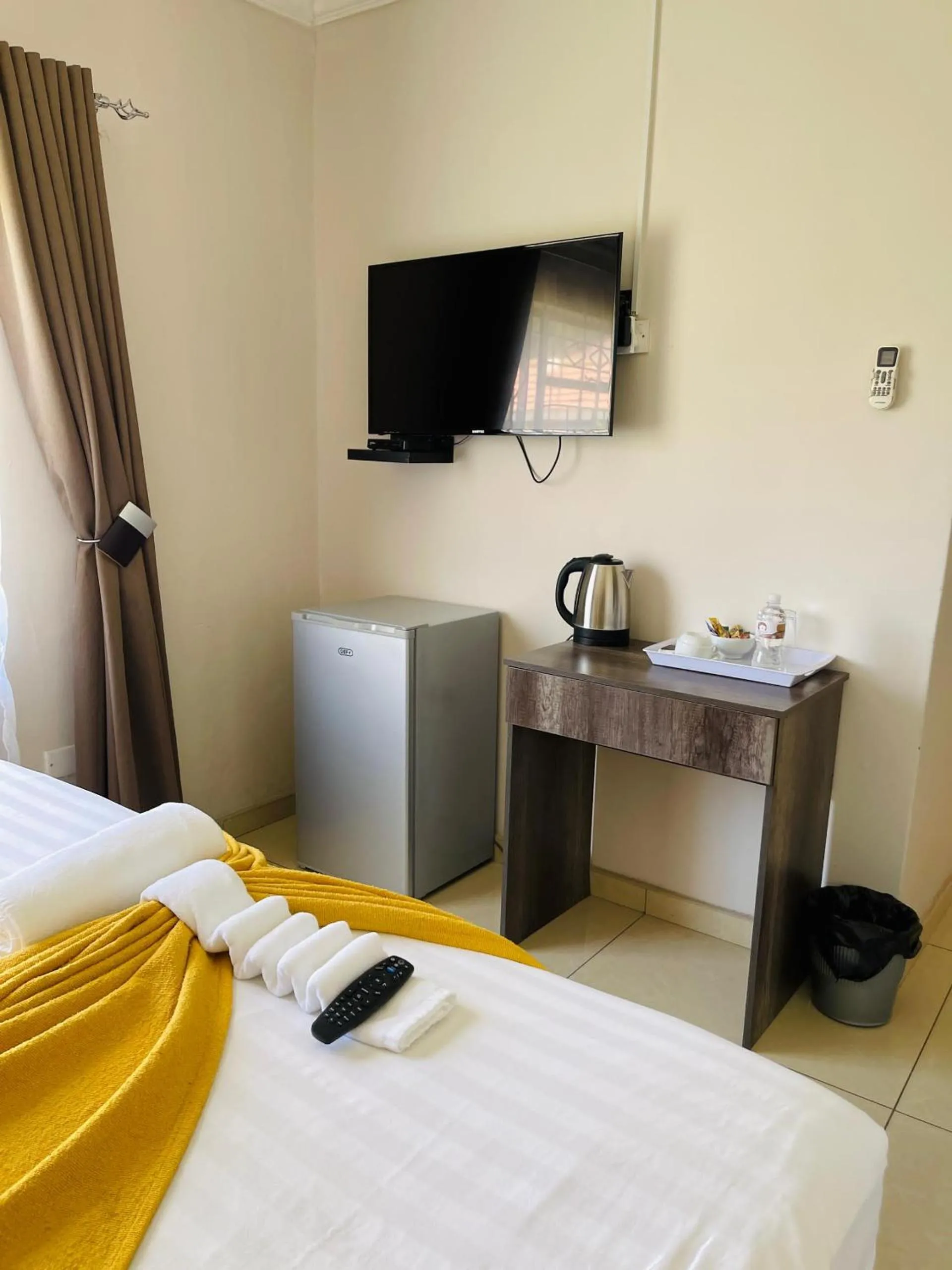 TV and multimedia, Bed in Magville Guest House